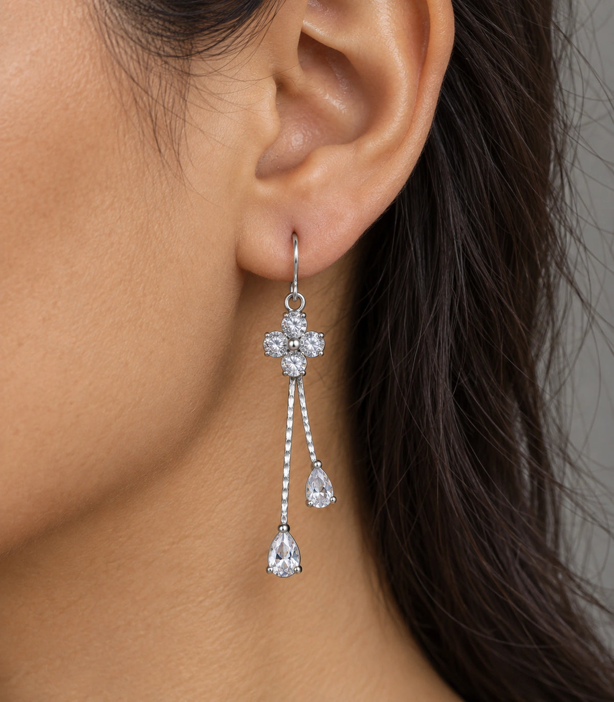 JIMIKI Silver-Tone Four Round Crystal Flower Twin Pear Drop Earrings in Silver Tone, close-up detail