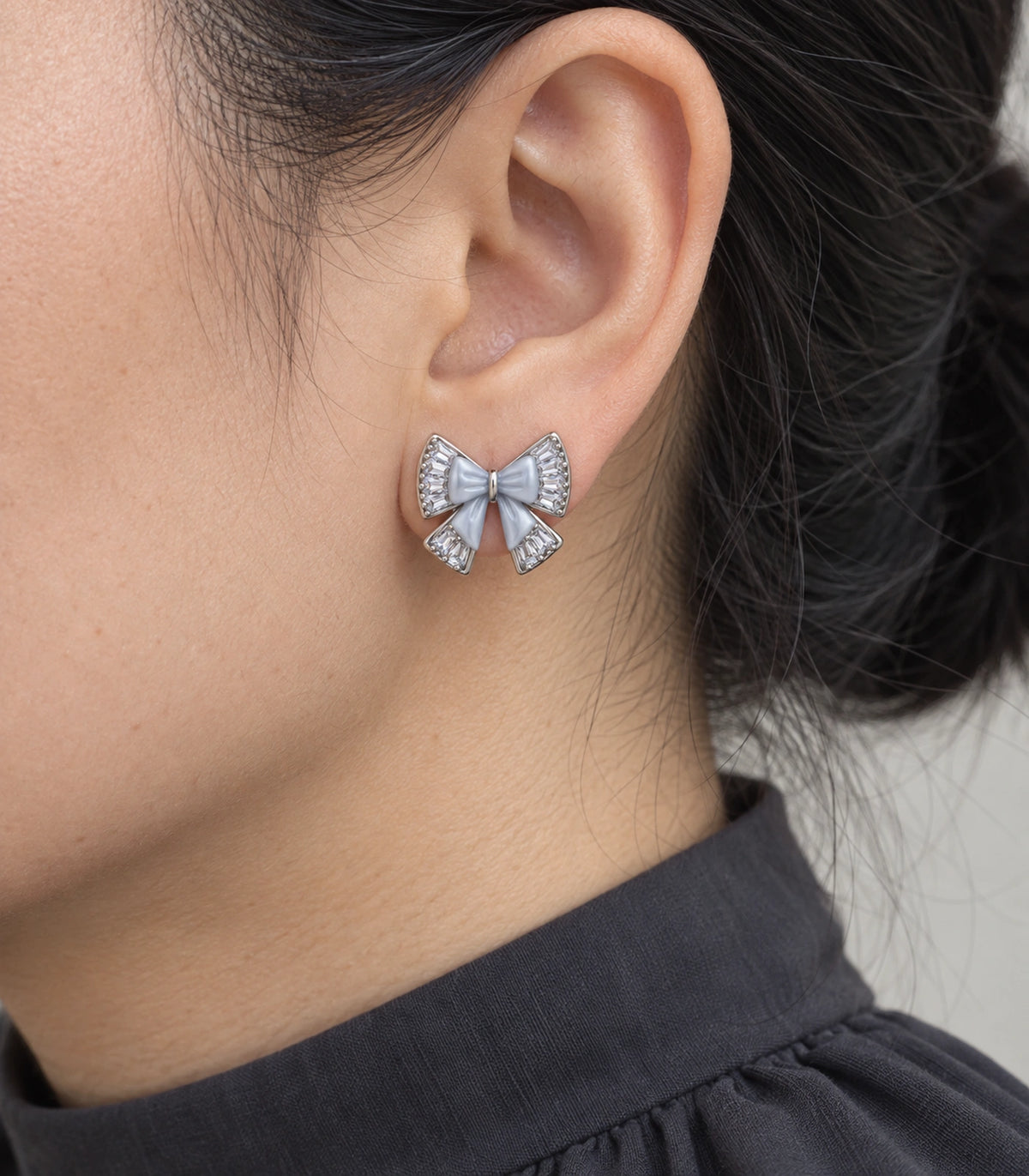 JIMIKI Silver Tone Grey Bow Clear Crystal Stud Earring Pair in Silver tone, close-up detail