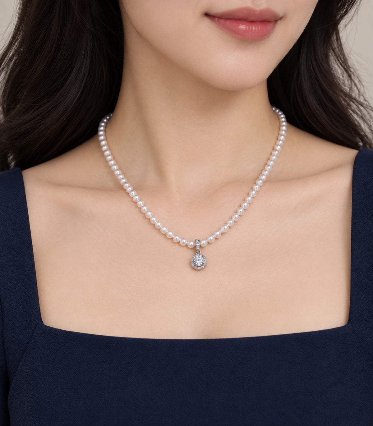 JIMIKI Silver-Tone Halo Crystal Pearl Necklace in Silver-tone / clear / white, worn with a simple outfit