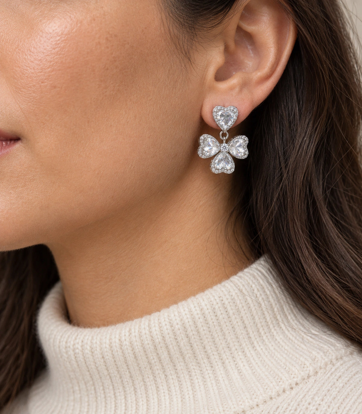 JIMIKI Heart Crystal Three Petal Drop Earring Pair in Silver-tone, model wearing view #color_silver-tone