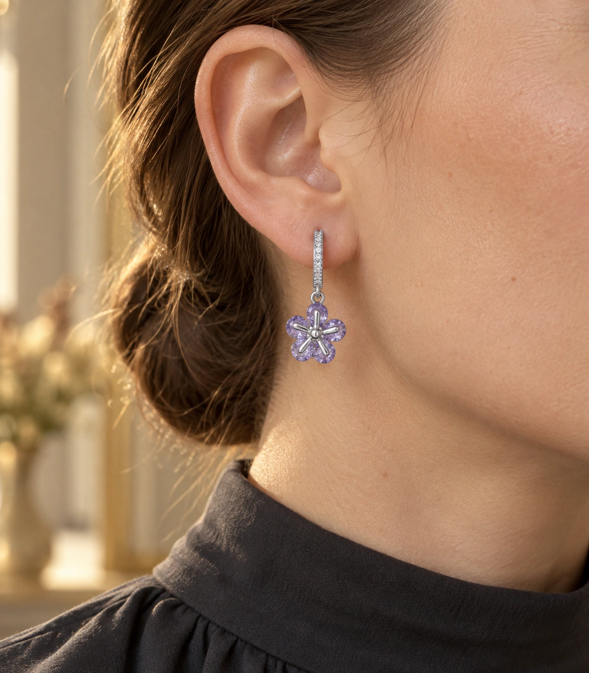 JIMIKI Silver-Tone Lavender Crystal Five-Petal Flower Huggie Earrings in Silver / Lavender, editorial model view