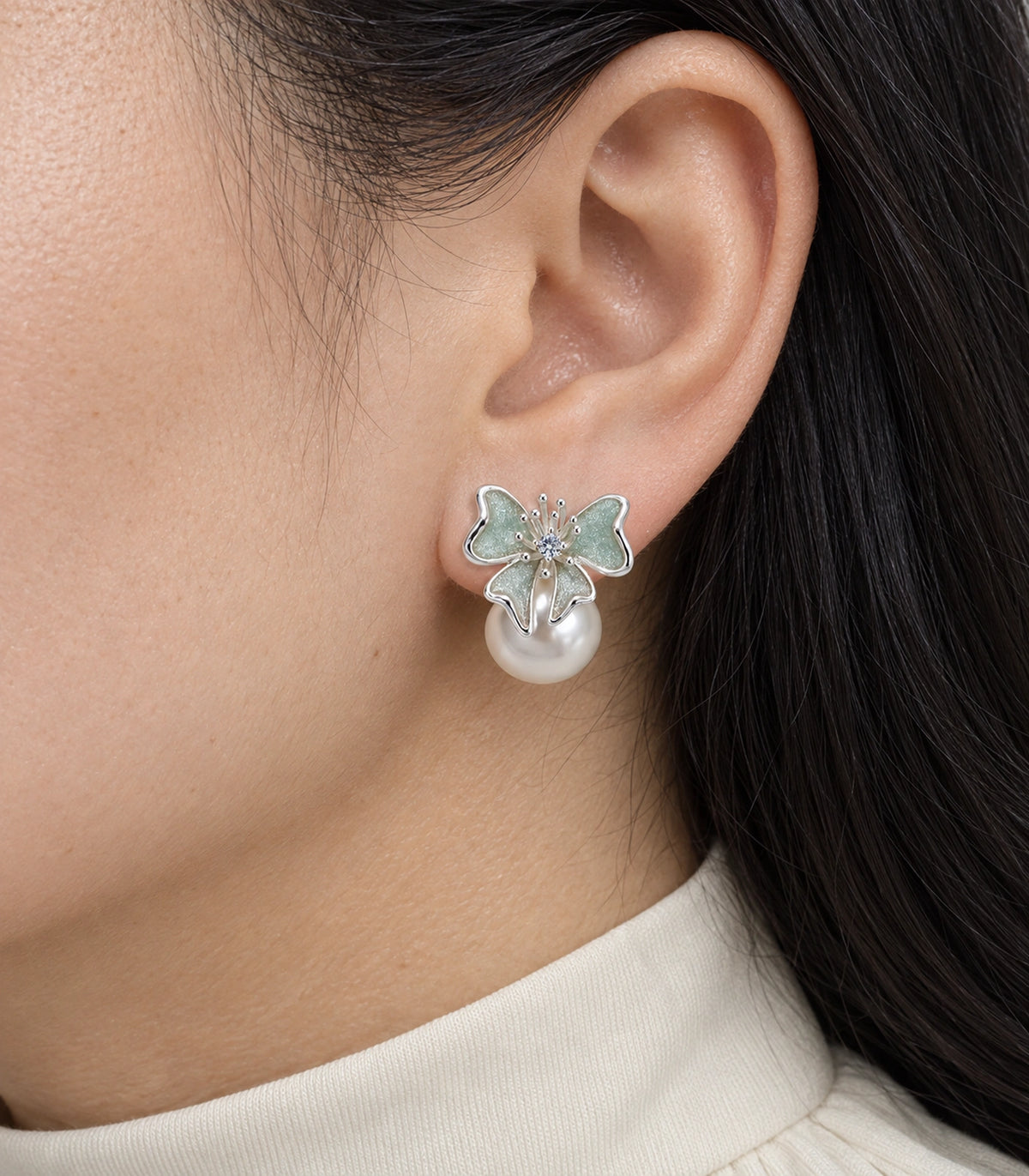 JIMIKI Butterfly Pearl Stud Earring Pair in Silver Tone / Mint, close-up detail #color_silver tone / mint