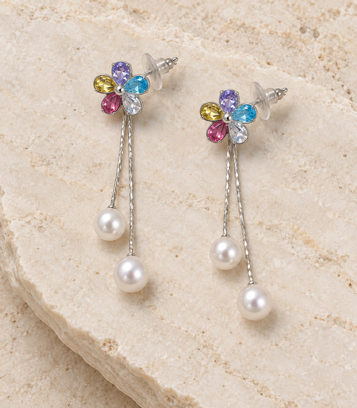JIMIKI Silver Tone Multicolour Flower Twin Pearl Drop Earring Pair in Silver-tone, editorial flat lay