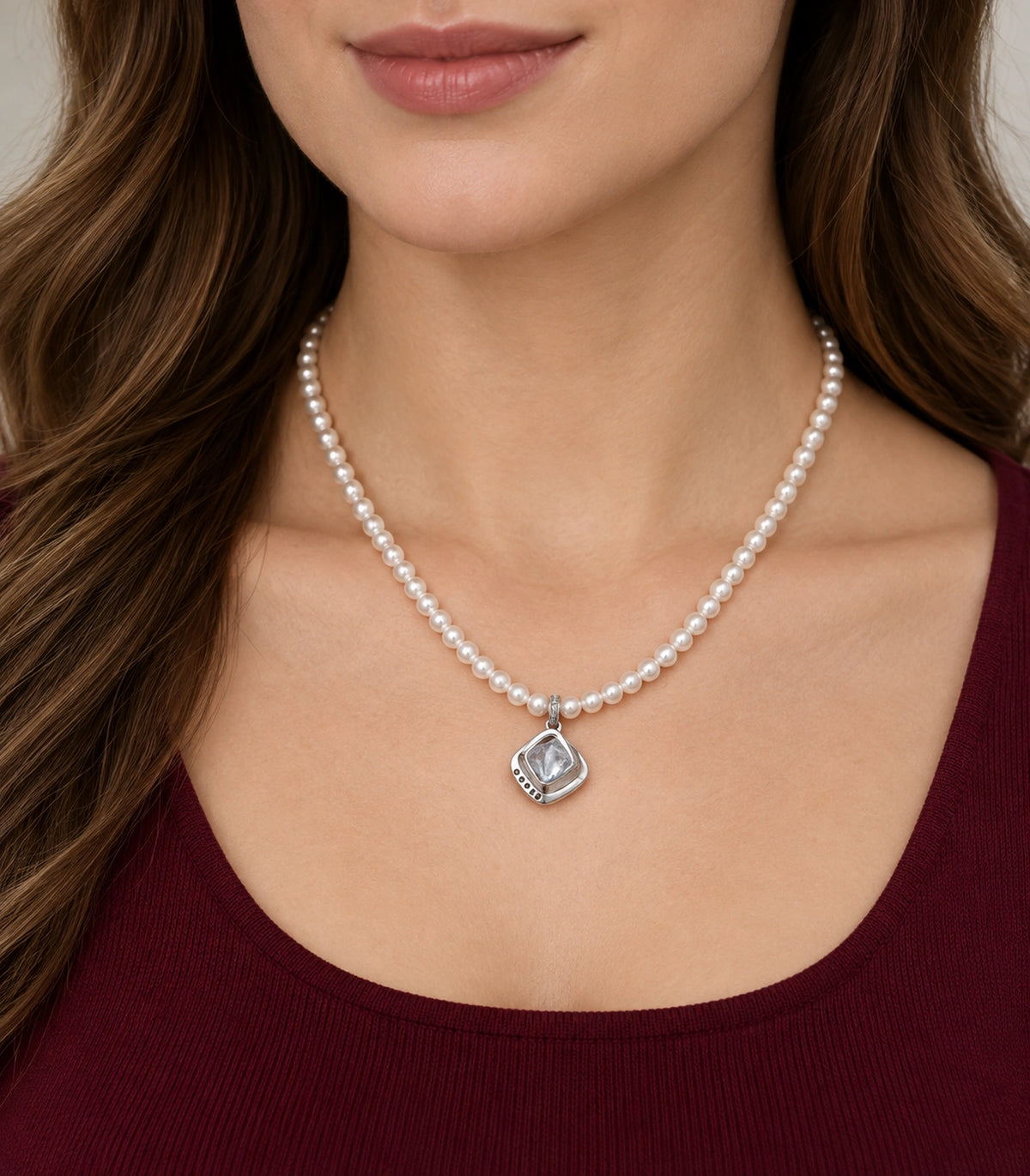 JIMIKI Silver-Tone Organic Cushion Crystal Pearl Necklace in Silver-tone / clear / white, worn with a simple outfit