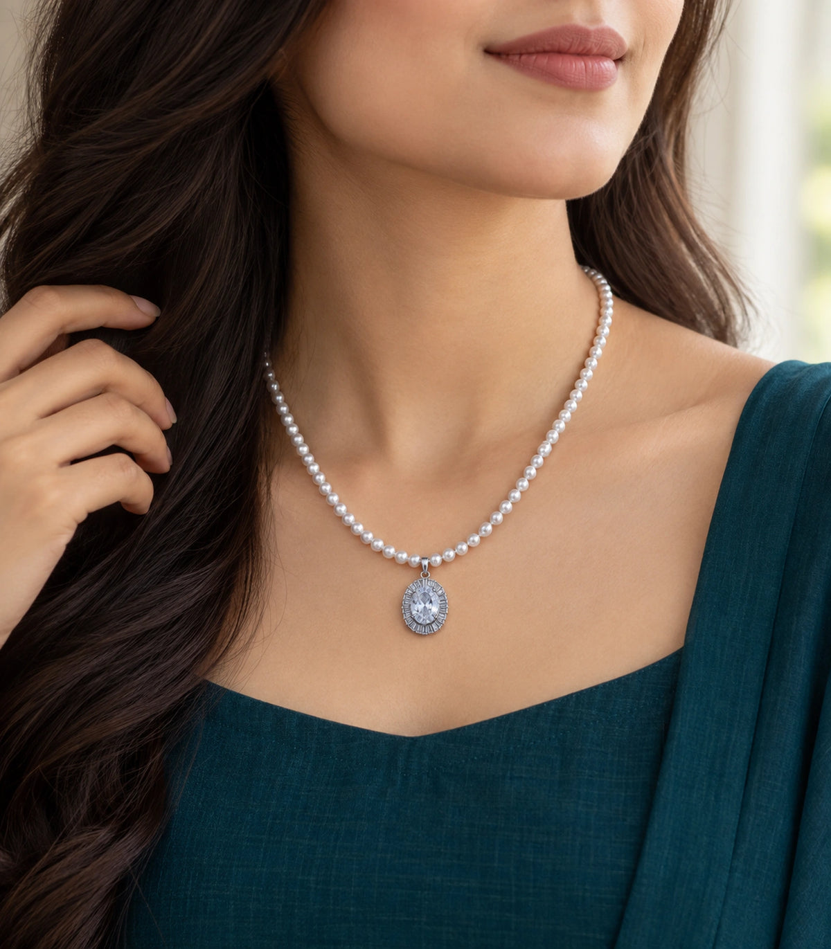 JIMIKI Silver-Tone Oval Baguette Halo Pearl Necklace in Silver-tone / clear / white, styled on a model in an editorial setting