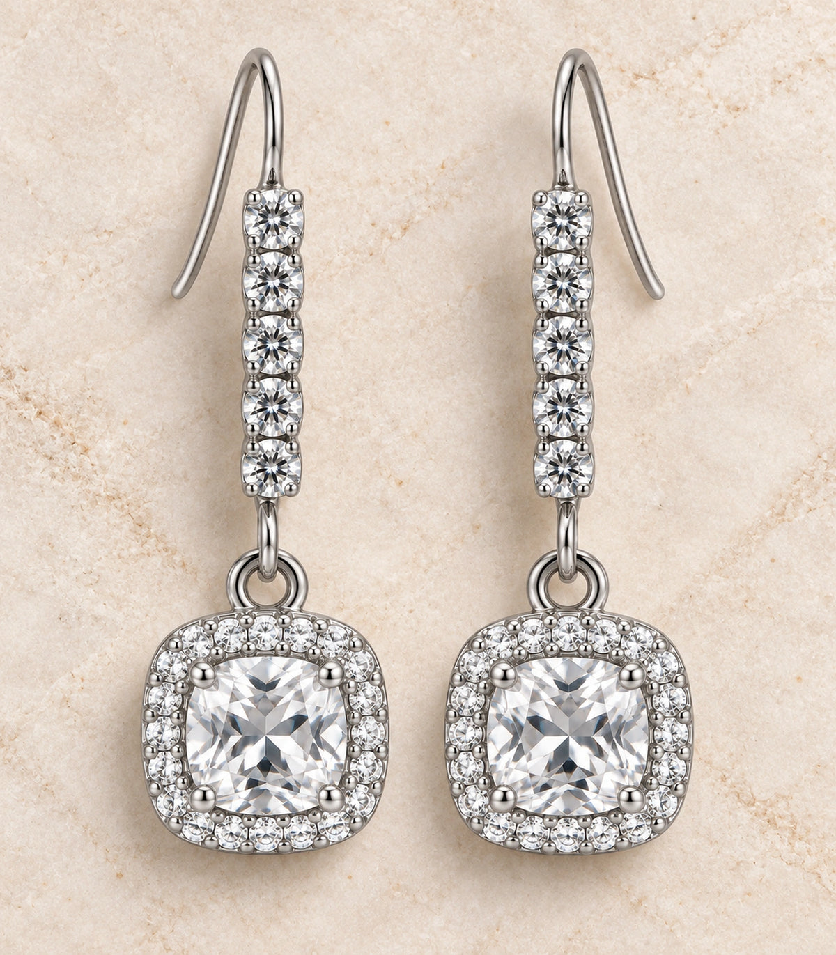 JIMIKI Cushion Halo Hook Drop Earring Pair in Silver tone / pale blue, editorial flat lay #color_silver tone / pale blue