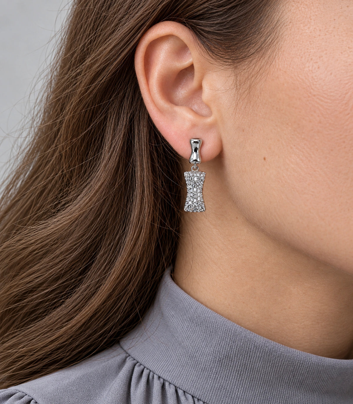 JIMIKI Pave Hourglass Drop Earring Pair in Silver tone, close-up detail #color_silver tone