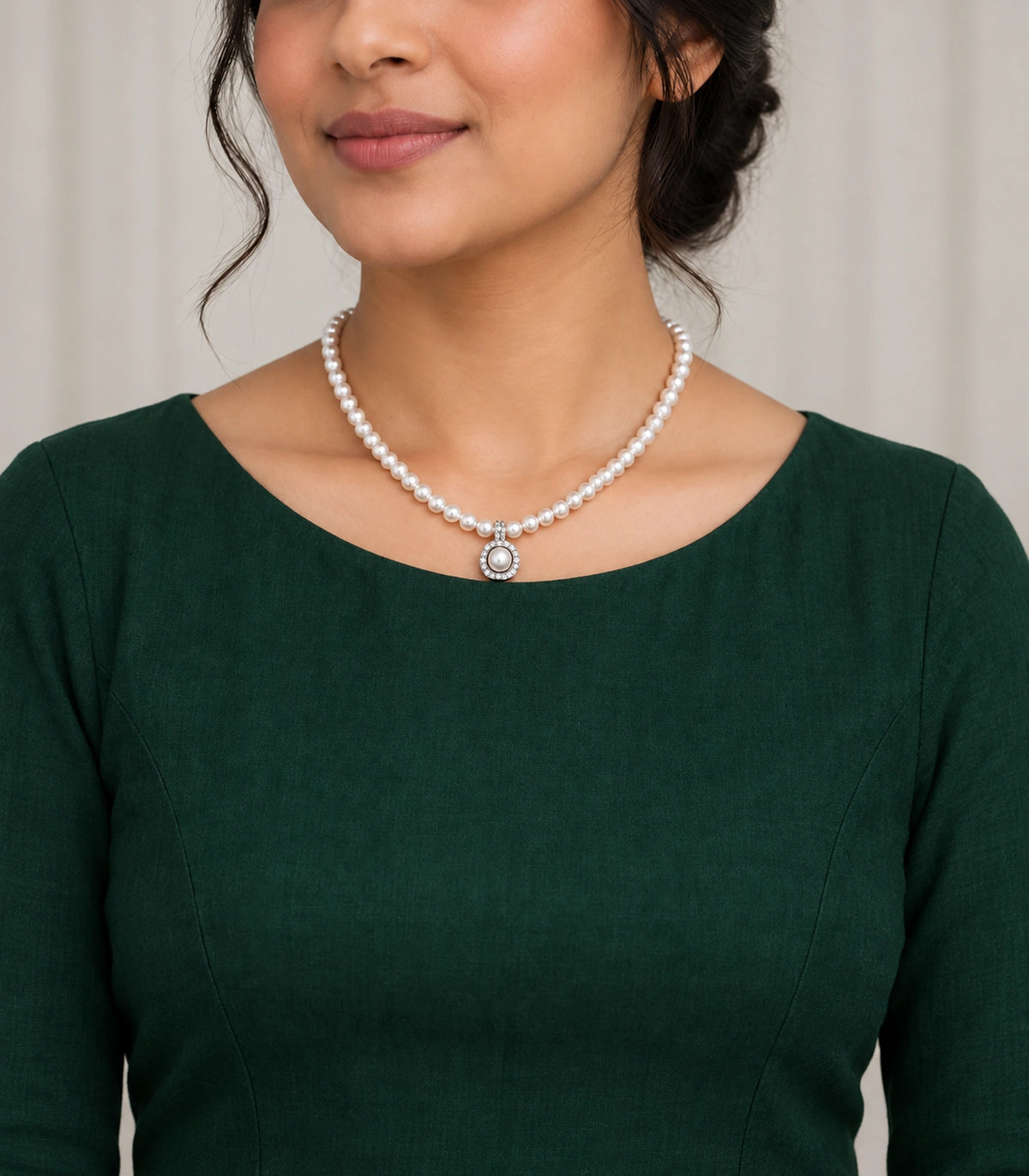 JIMIKI Silver-Tone Pearl Halo Pendant Necklace in Silver-tone, worn with a simple outfit