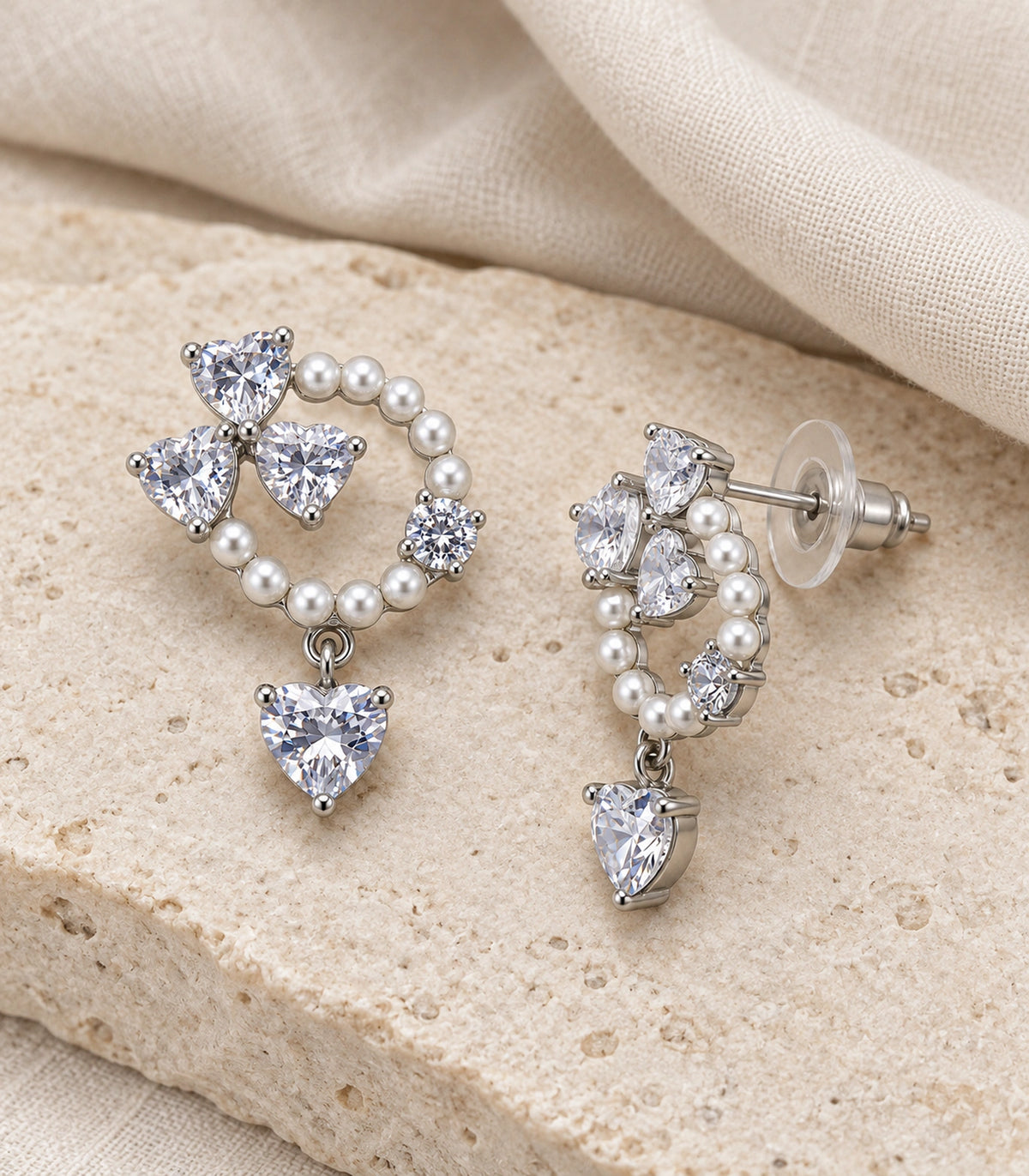 JIMIKI Pearl Ring Crystal Heart Drop Earring Pair in Silver tone / white, editorial flat lay #color_silver tone / white