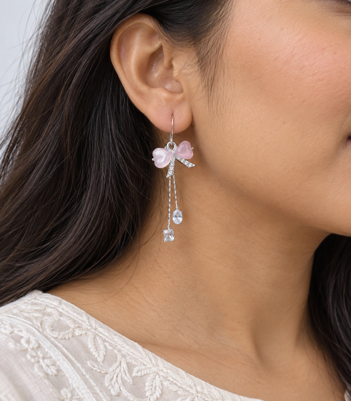 JIMIKI Silver Tone Pink Bow Pear Square Chain Earring Pair in Silver-tone, model wearing view