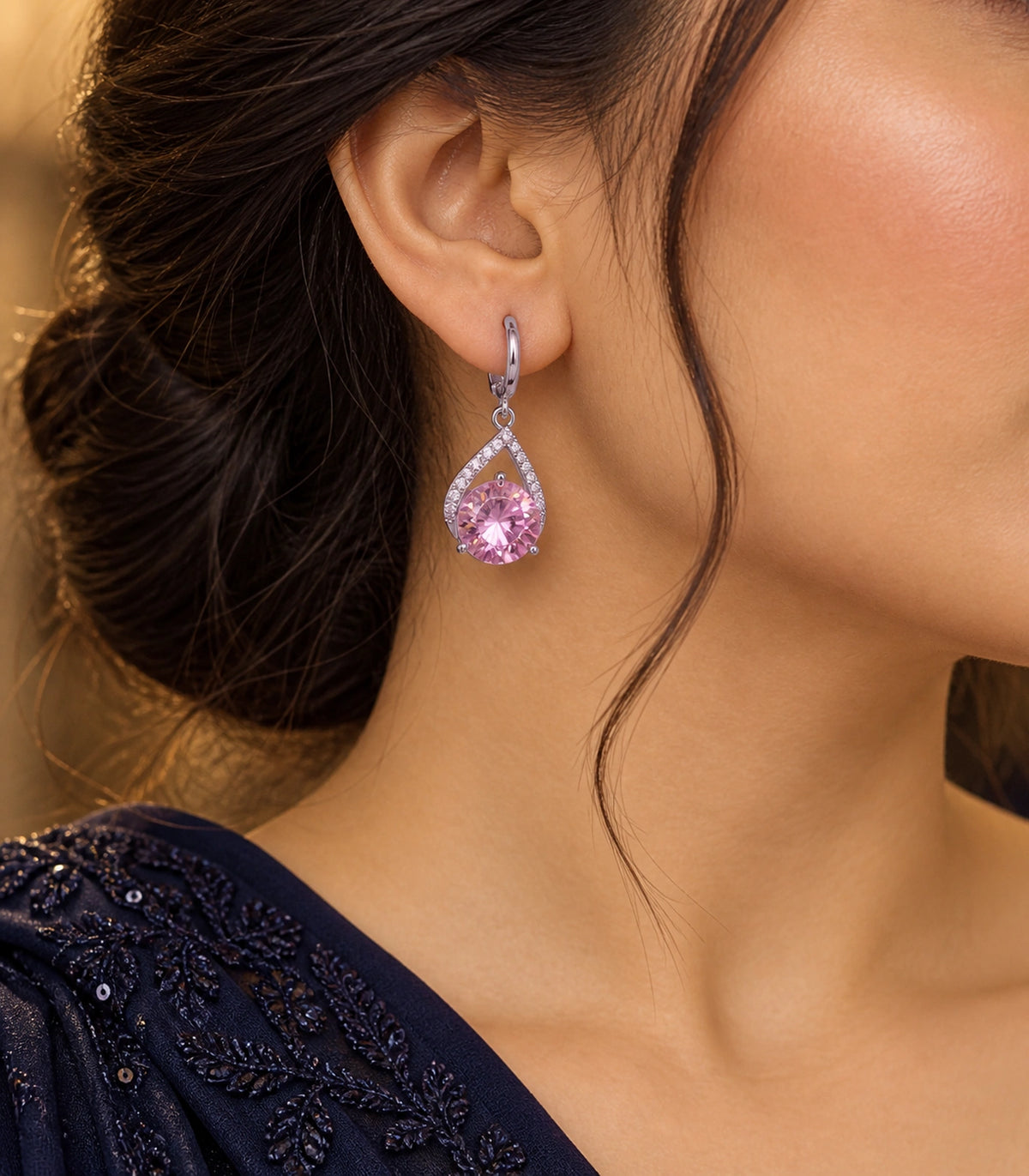 JIMIKI Silver-Tone Pink Crystal Teardrop Huggie Earrings in Silver / Pink, editorial model view
