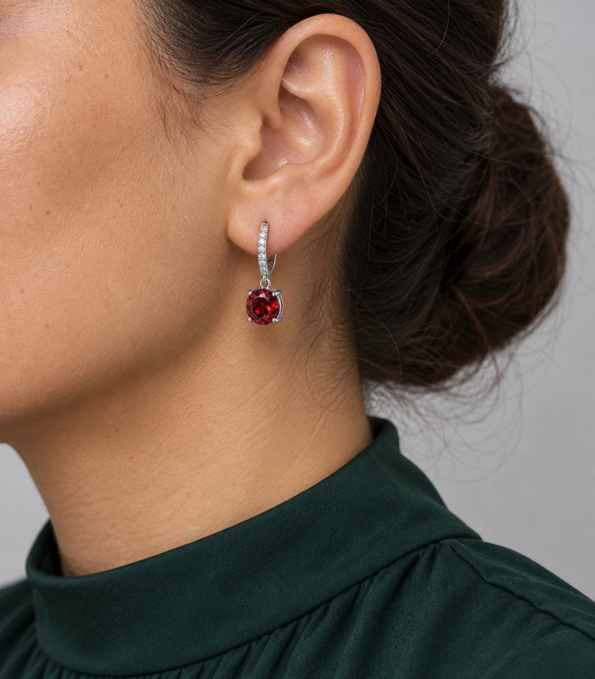 JIMIKI Round Crystal Hoop Drop Earring Pair in Silver tone / red, model wearing view #color_silver tone / red