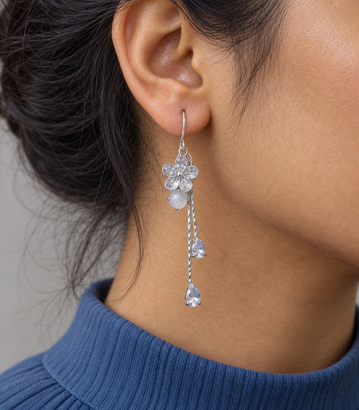 JIMIKI Silver Tone Rounded Flower White Stone Twin Pear Earring Pair in Silver-tone, close-up detail