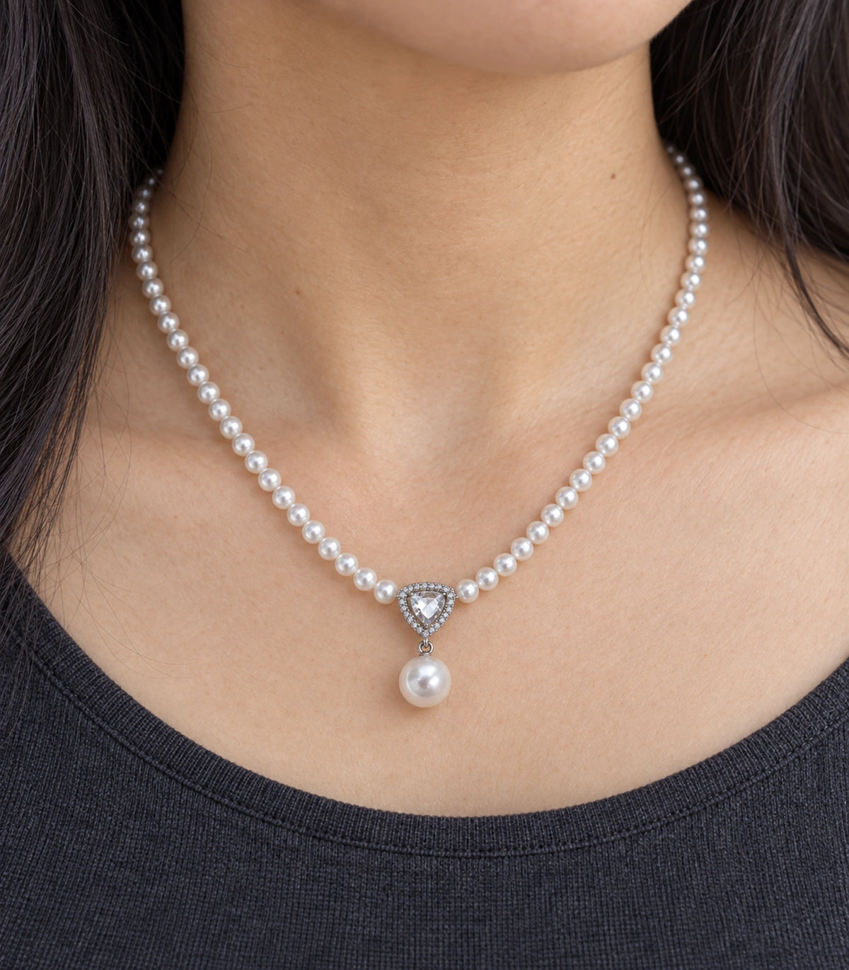 JIMIKI Silver Tone Shield Crystal Pearl Drop Necklace in Silver / White, close-up detail