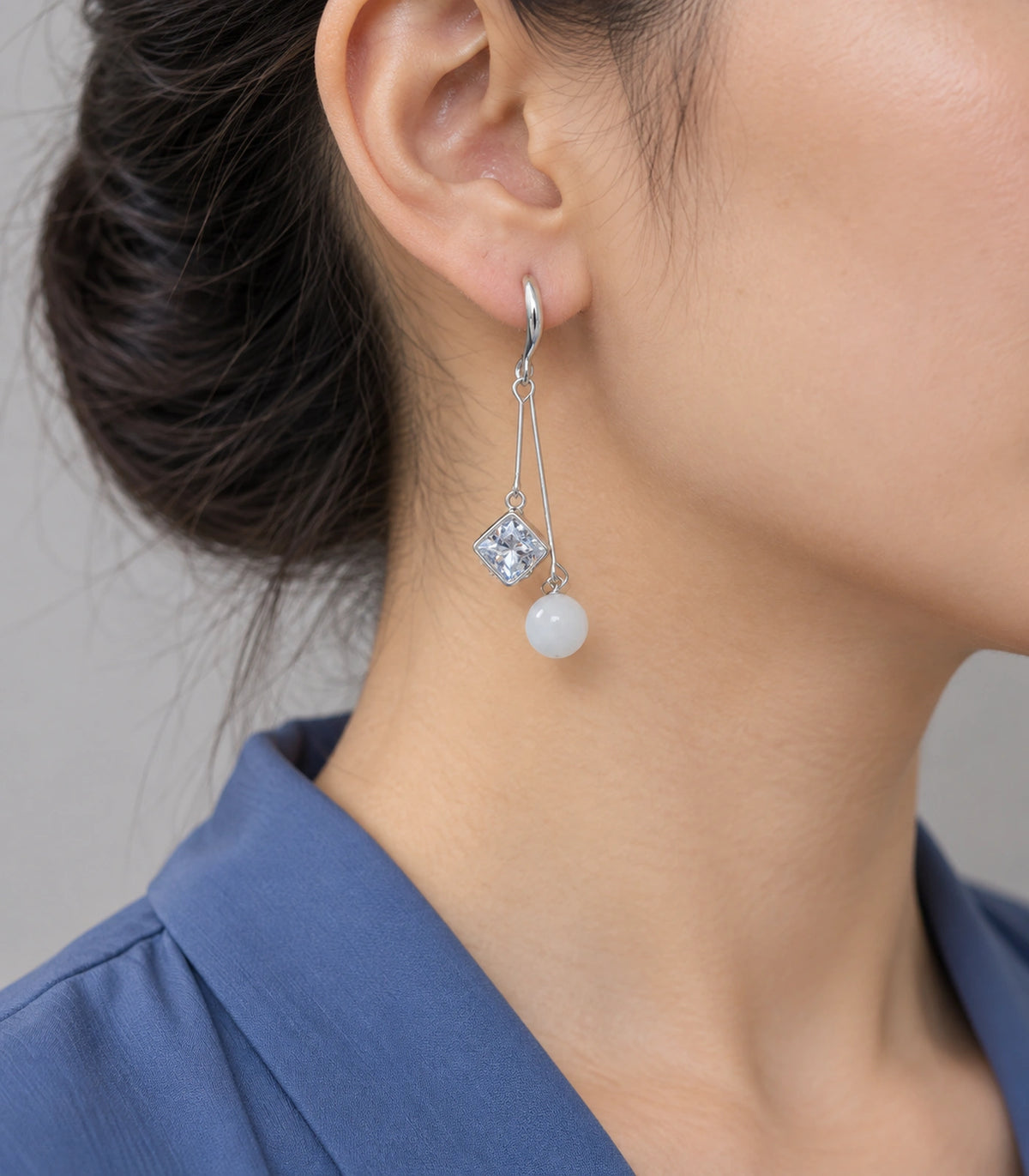 JIMIKI Silver Tone Square Crystal White Bead Wire Drop Earring Pair in Silver-tone, model wearing view