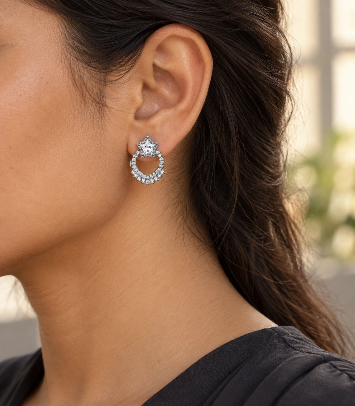 JIMIKI Star Crystal Open Loop Stud Earring Pair in Silver Tone, editorial model view #color_silver tone