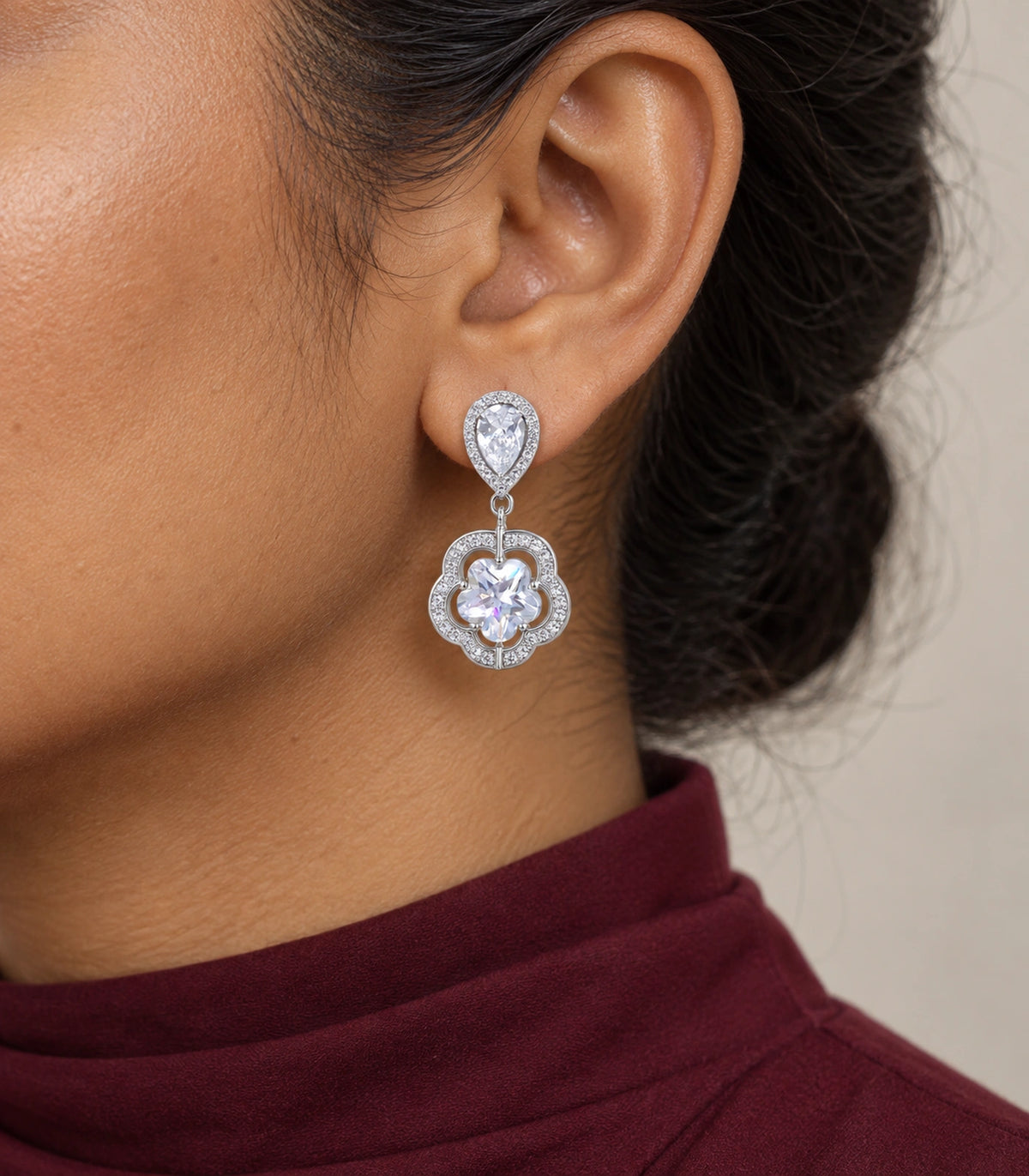 JIMIKI Teardrop Flower Crystal Drop Earring Pair in Silver-tone, model wearing view #color_silver-tone