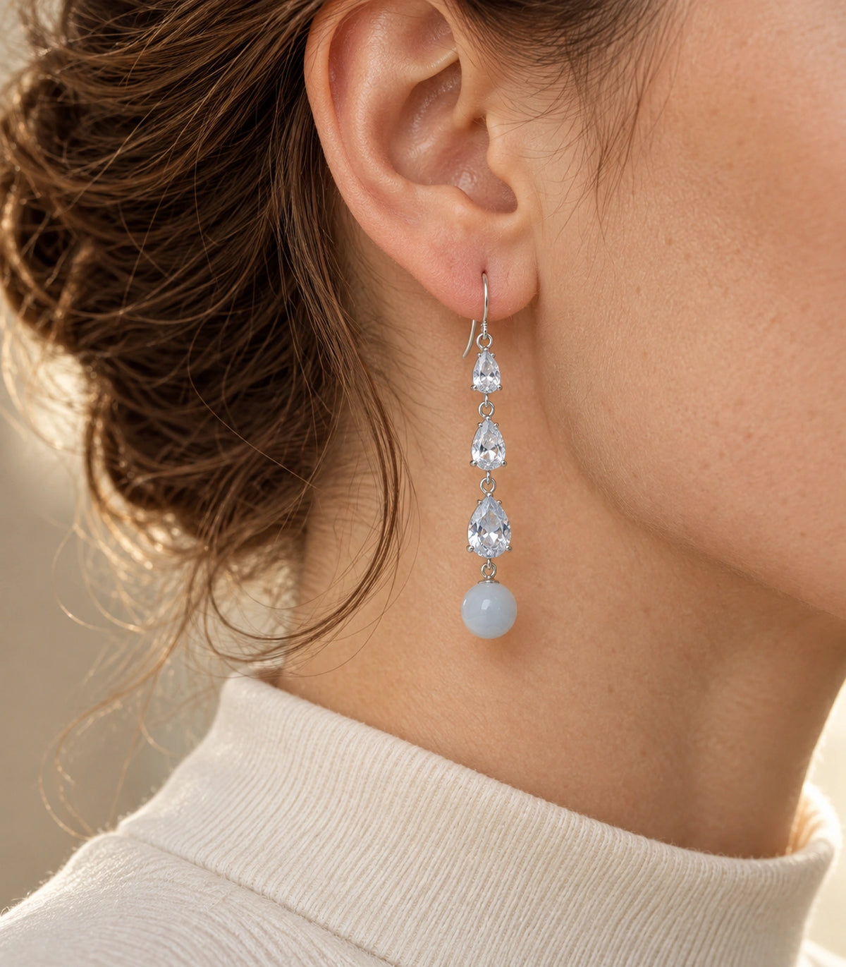 JIMIKI Silver Tone Three Pear White Bead Drop Earring Pair in Silver-tone, editorial model view