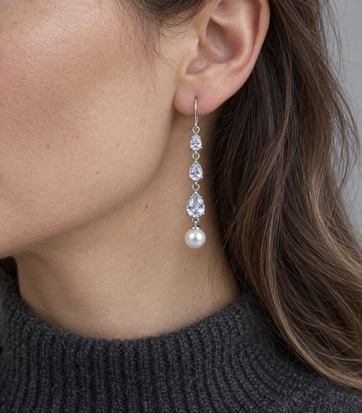 JIMIKI Silver-Tone Triple Pear Crystal Pearl Drop Earrings in Silver Tone, model wearing view