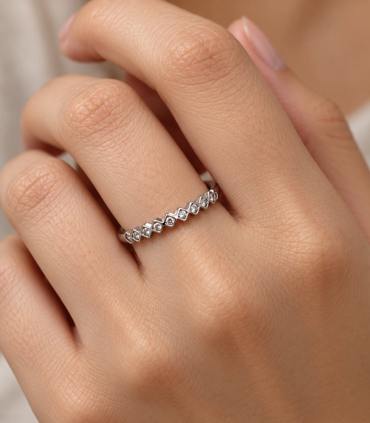 JIMIKI Silver Zigzag Crystal Band Ring in Silver - close-up details #color_silver