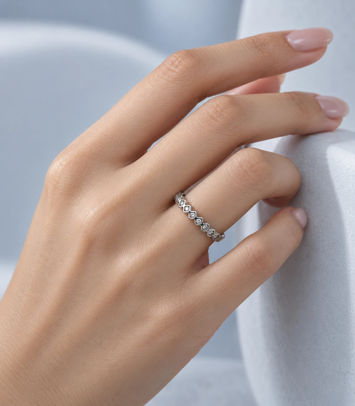 JIMIKI Silver Zigzag Crystal Band Ring in Silver - editorial worn view #color_silver