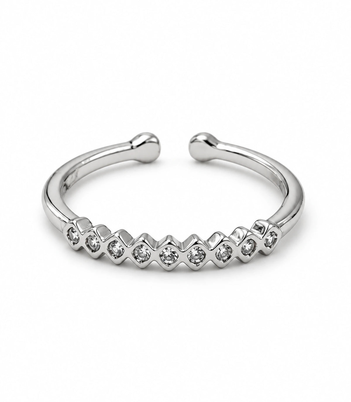 JIMIKI Silver Zigzag Crystal Band Ring in Silver - ring on white #color_silver
