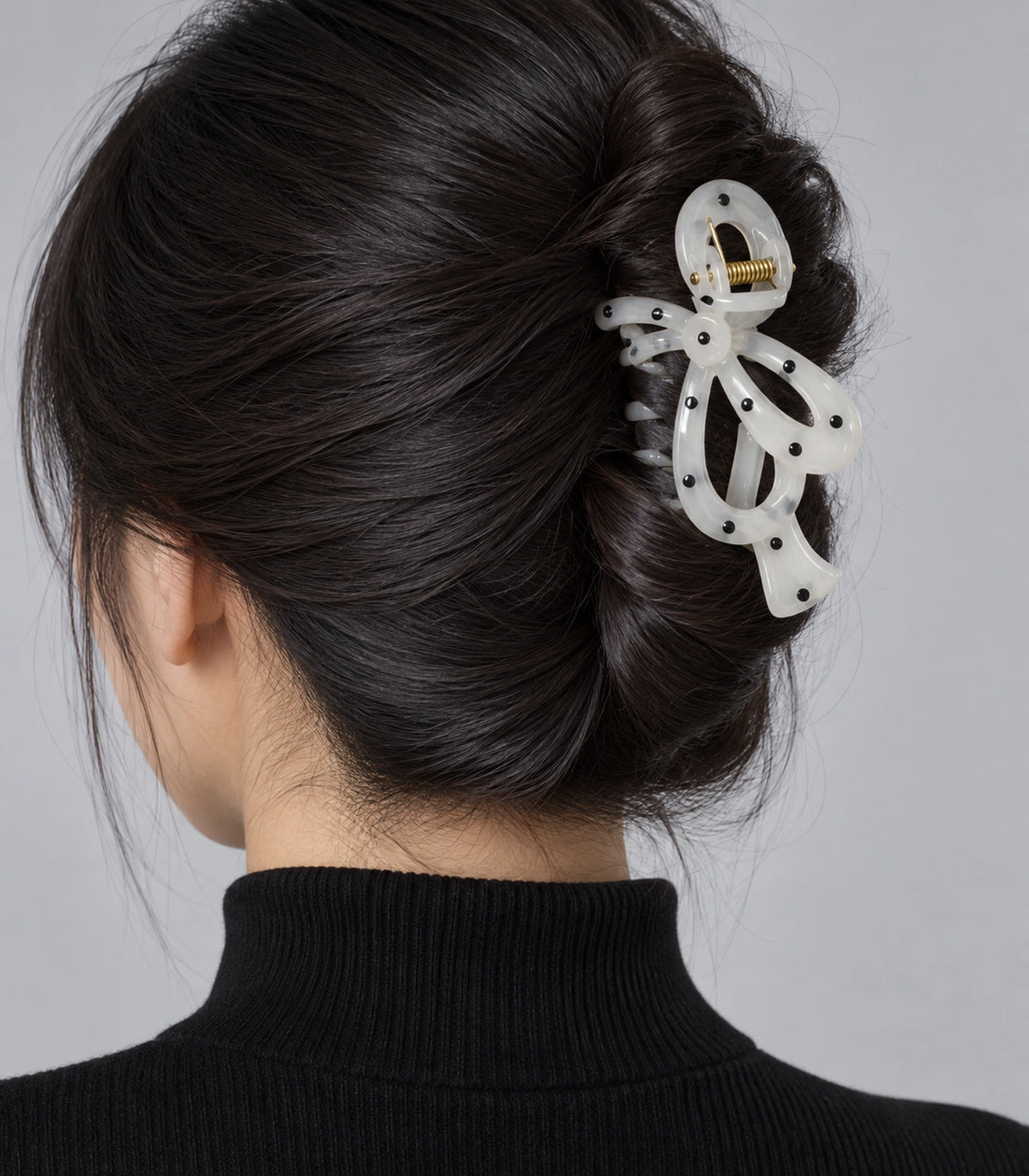 JIMIKI Polka Dot Openwork Bow Hair Claw Clips in White / Black, model wearing view #color_white / black