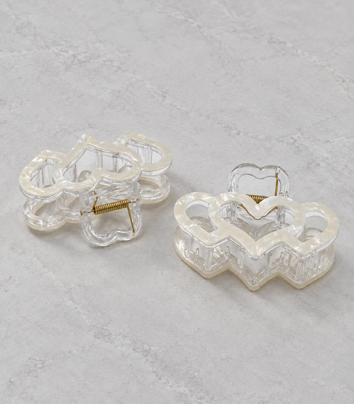 JIMIKI Triple Heart Hair Claw Clips in White, editorial flat lay #color_white