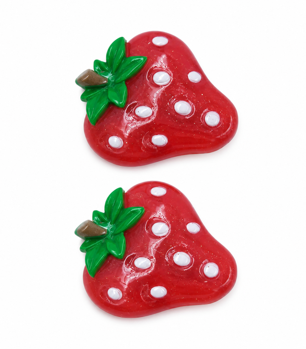 White Seed Strawberry Barrette Pair on white background