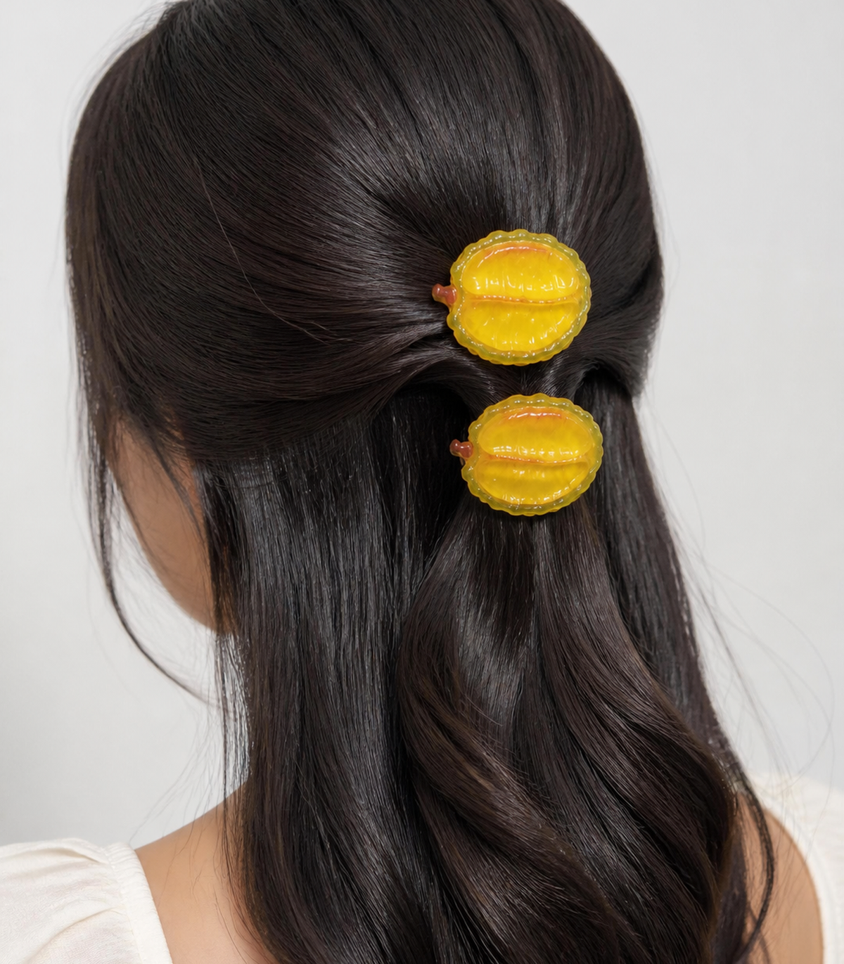 Yellow Citrus Barrette Pair styled editorial view