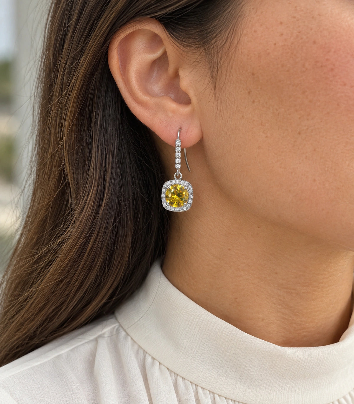 JIMIKI Crystal Cushion Halo Hook Earring Pair in Silver tone / yellow, model wearing view #color_silver tone / yellow