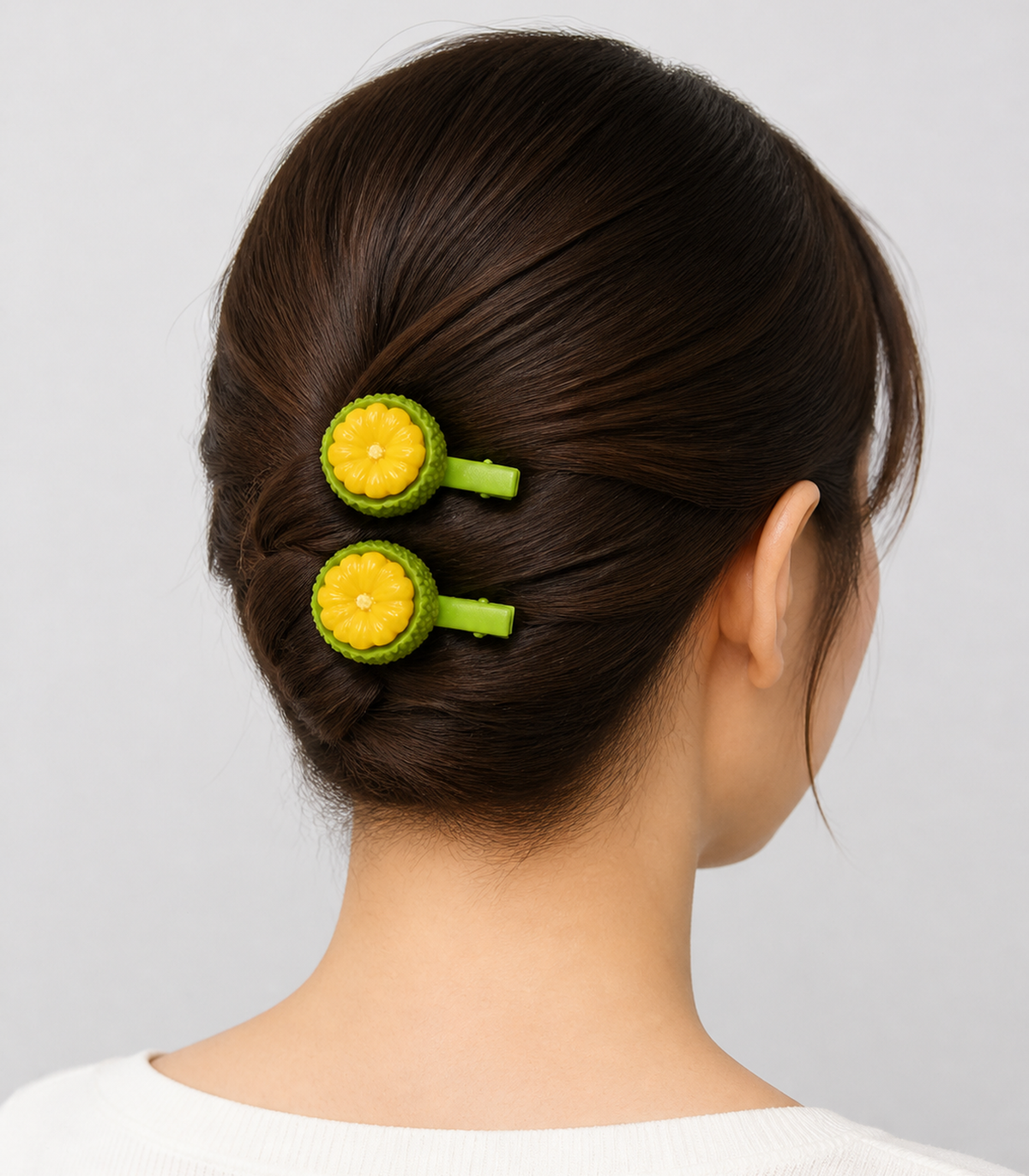 Yellow Flower Fruit Barrette Pair styled editorial view