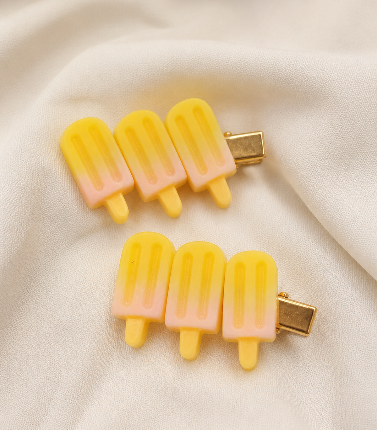 Yellow Popsicle Trio Clip Pair in close-up detail