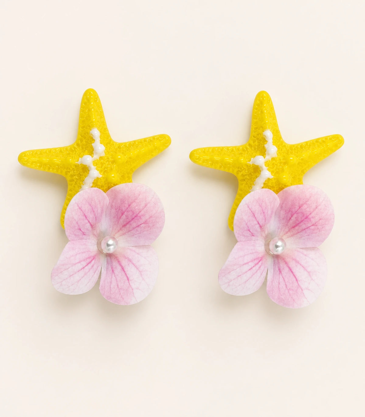 Close-up of the Yellow Starfish Pink Flower Clip Pair details