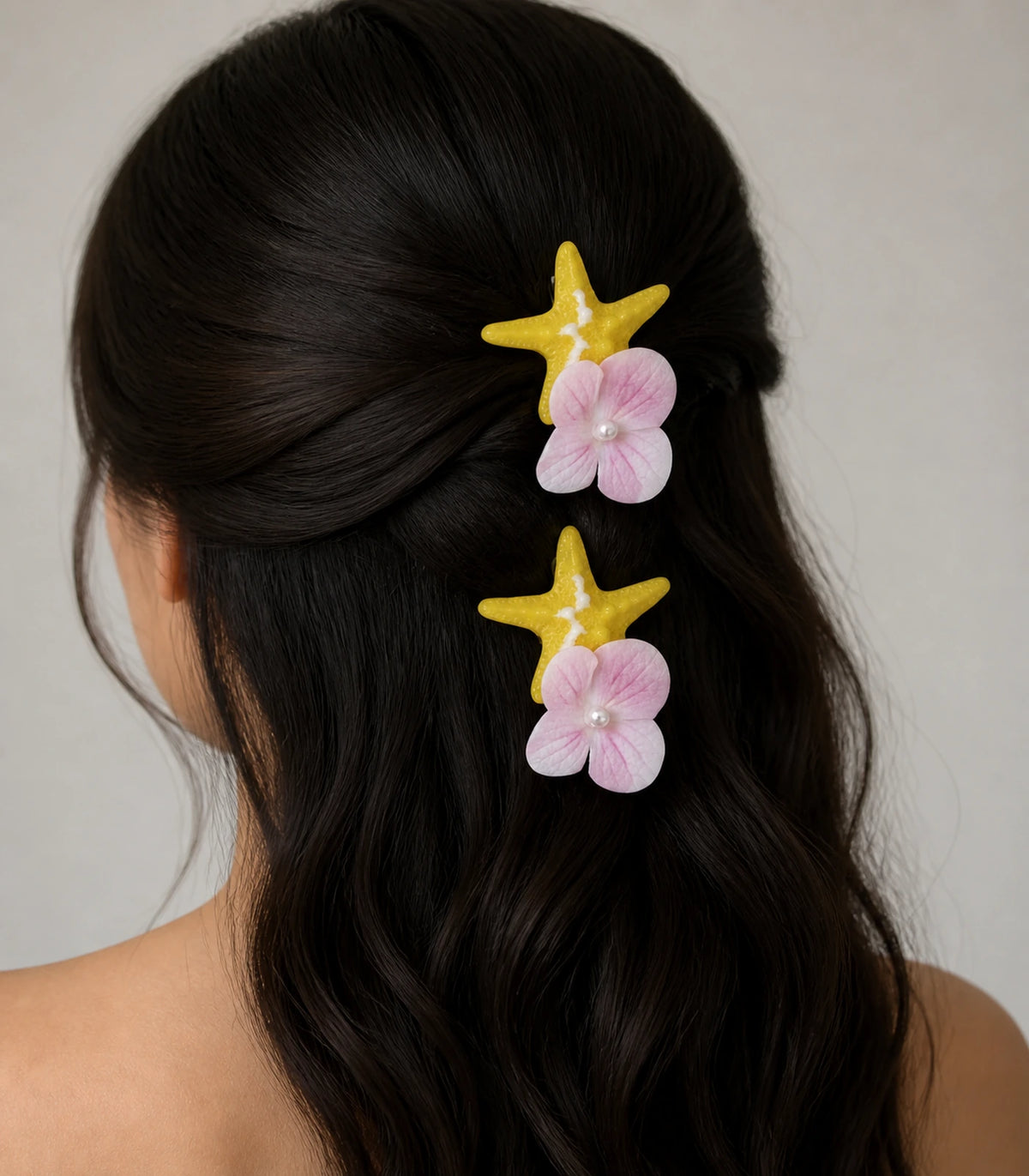 Editorial model view of the Yellow Starfish Pink Flower Clip Pair