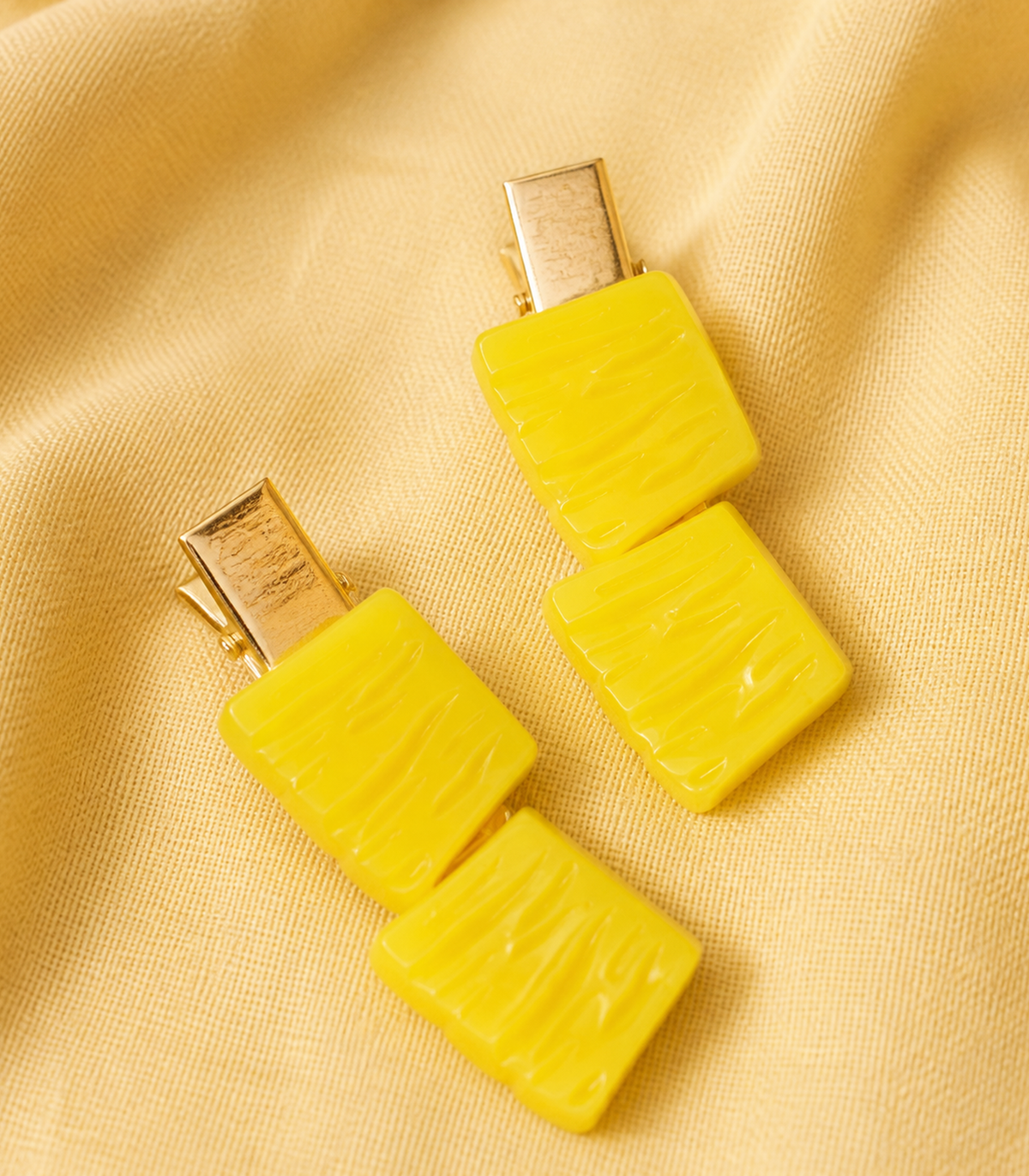 Yellow Wavy Duo Clip Pair in close-up detail