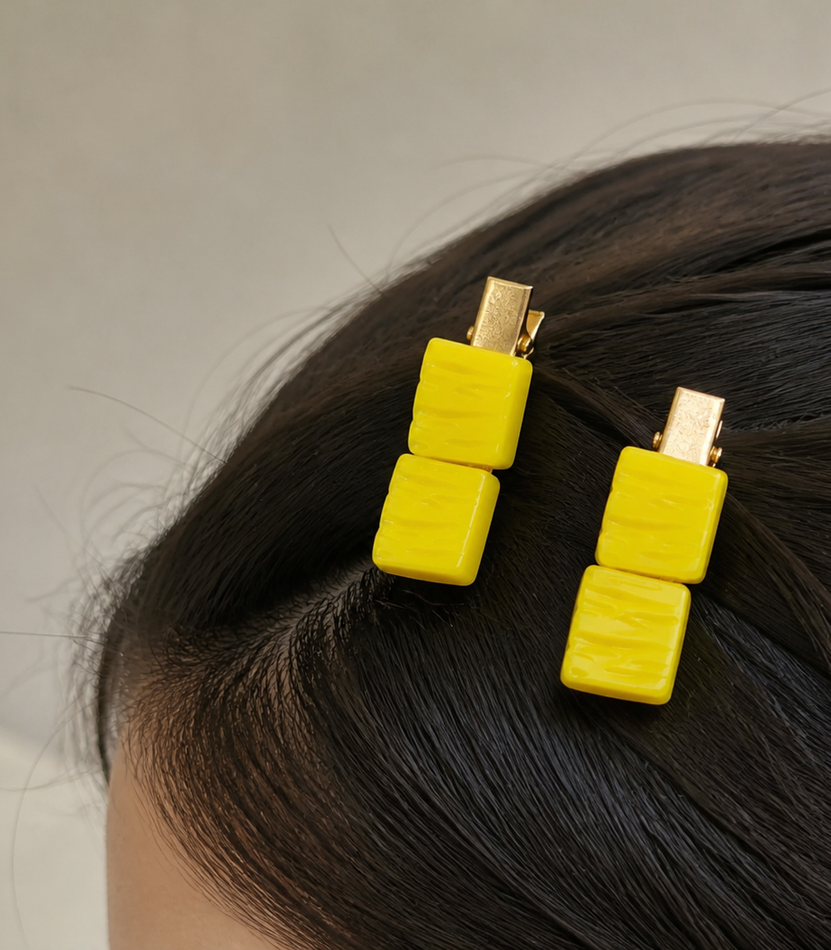 Yellow Wavy Duo Clip Pair in a styled editorial view