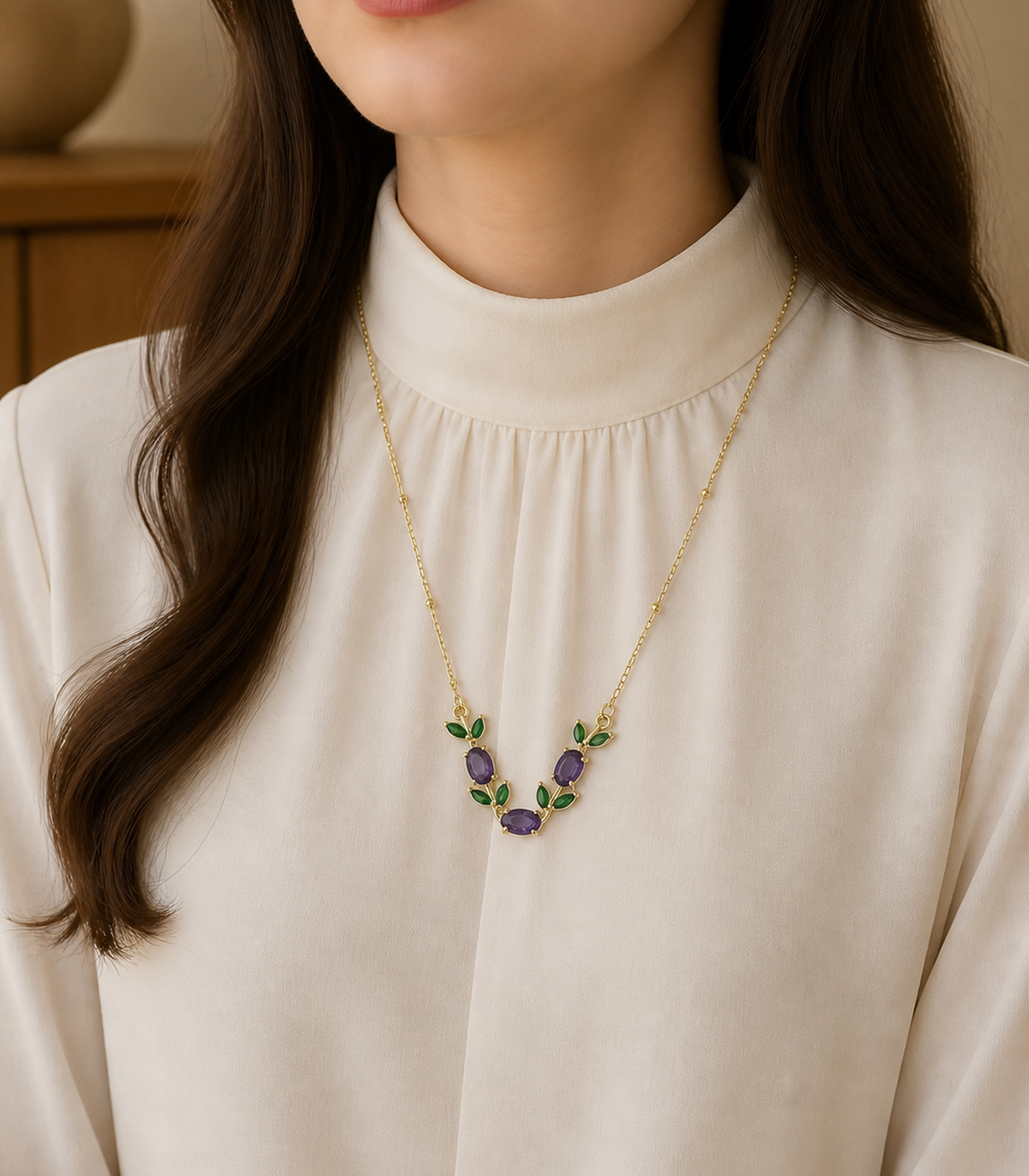 JIMIKI purple leaf station necklace styled on a model