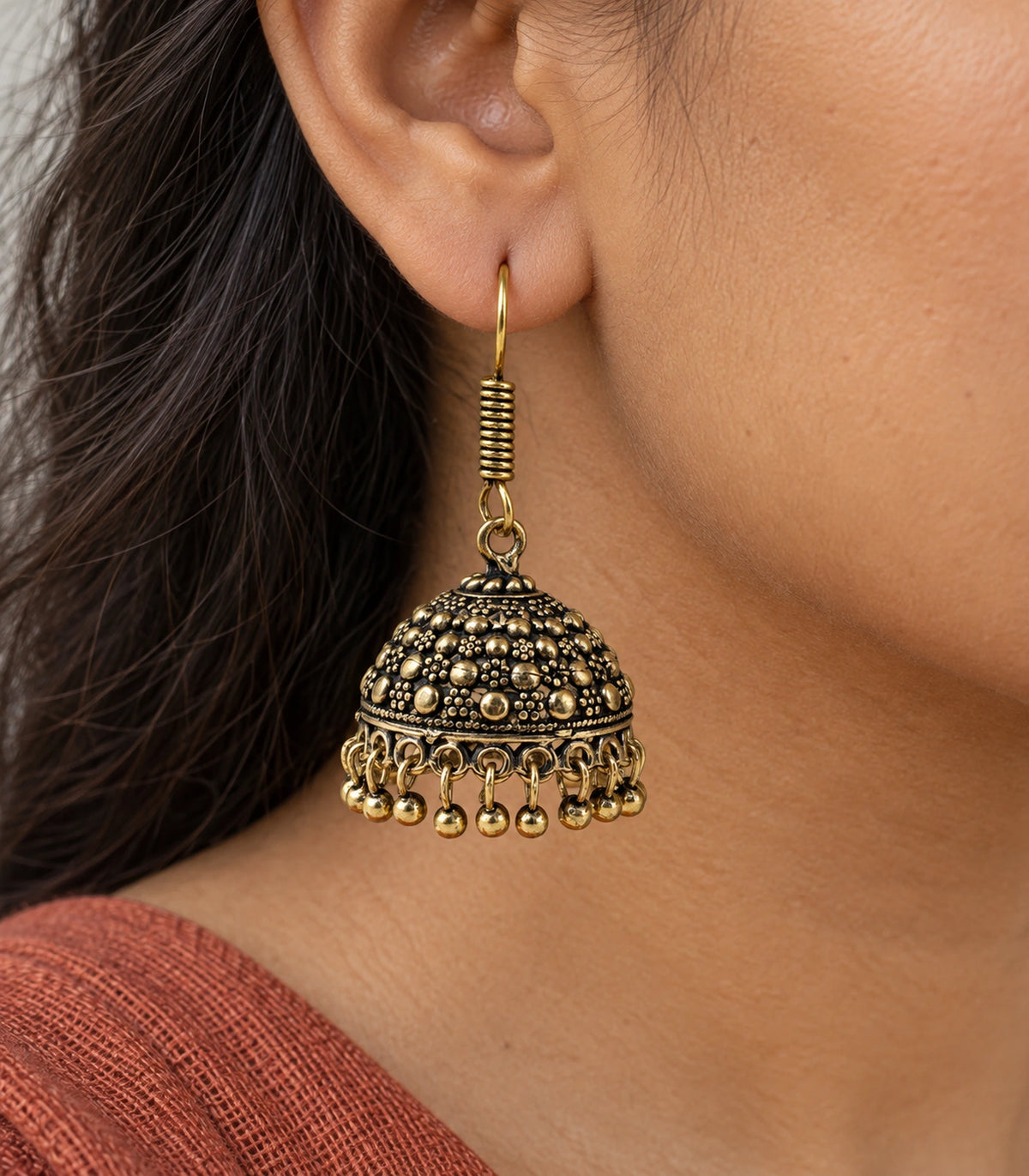 JIMIKI Antique Gold Dotted Dome Hook Jhumka Earrings in Antique Gold - close-up details #color_antique-gold