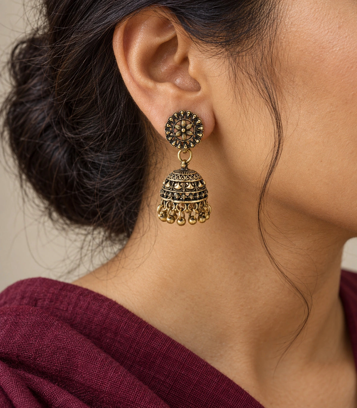 JIMIKI Antique Gold Floral Fan Dome Jhumka Earrings - close-up of the earring worn #color_antique-gold