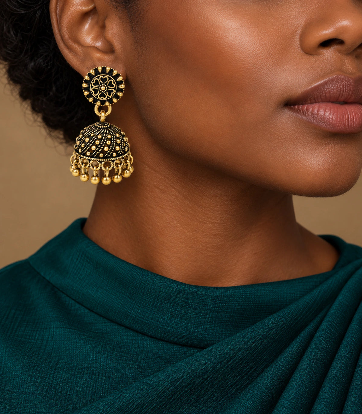 JIMIKI Antique Gold Floral Rosette Jhumka Earrings - Earring styled with a teal draped outfit #color_antique-gold