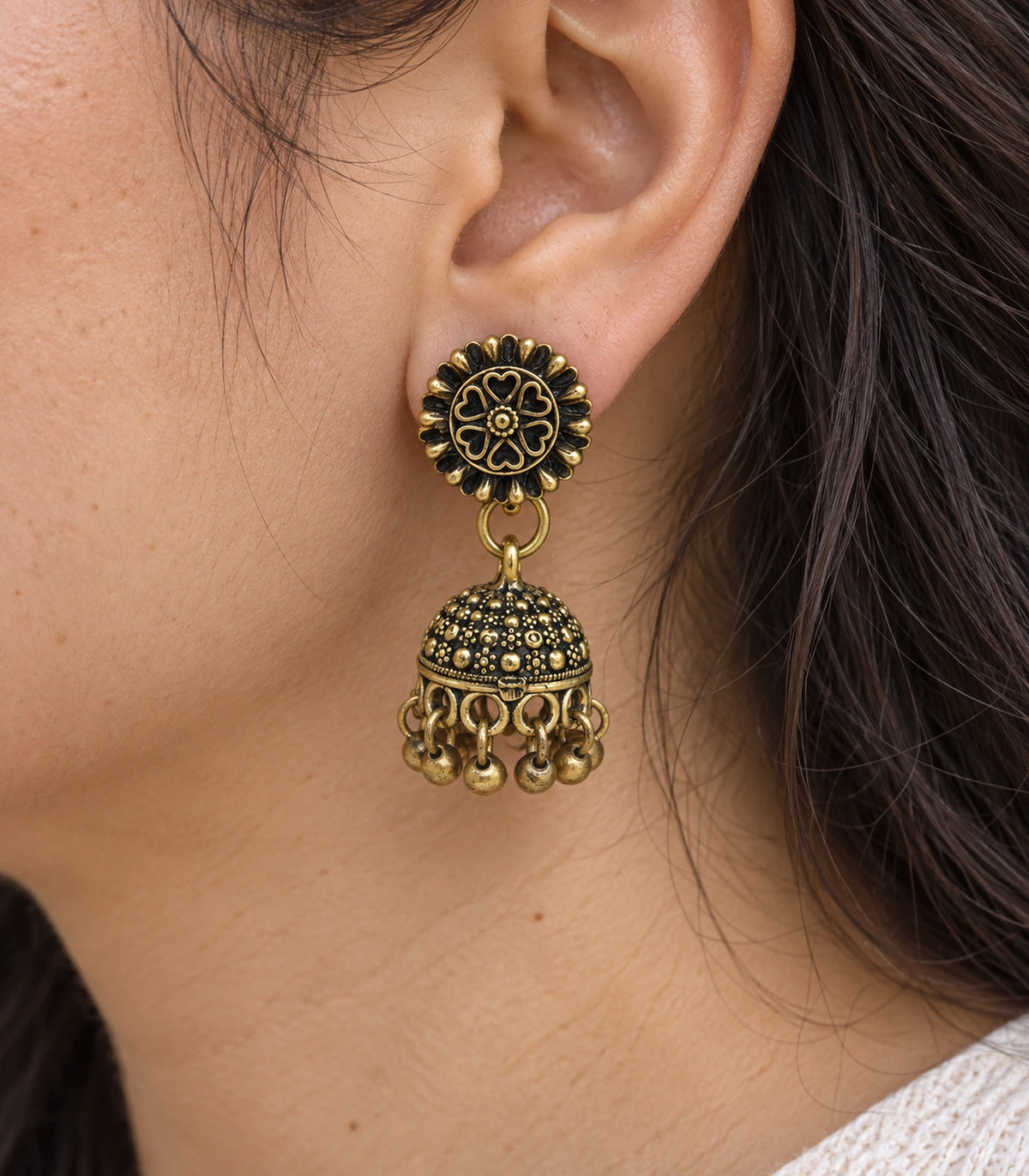 JIMIKI Antique Gold Heart Flower Stud Dotted Jhumka Earrings in Antique Gold - close-up details #color_antique-gold