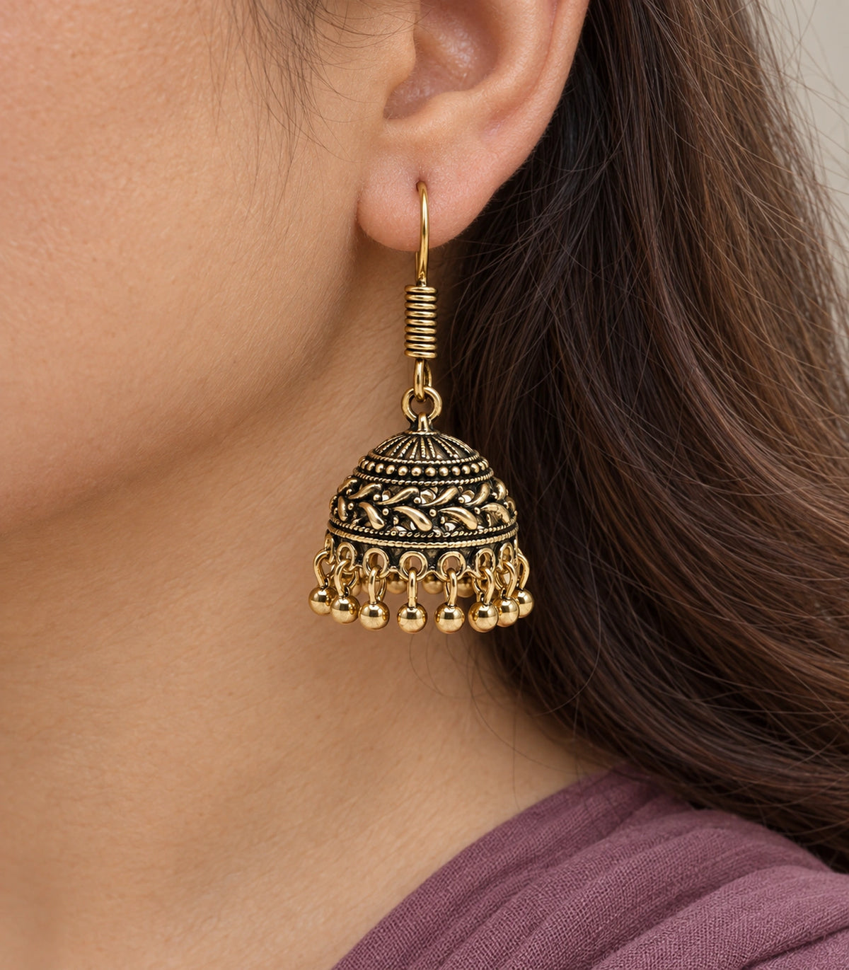 JIMIKI Antique Gold Leaf Scroll Dome Hook Jhumka Earrings - Close-up of the earring details #color_antique-gold