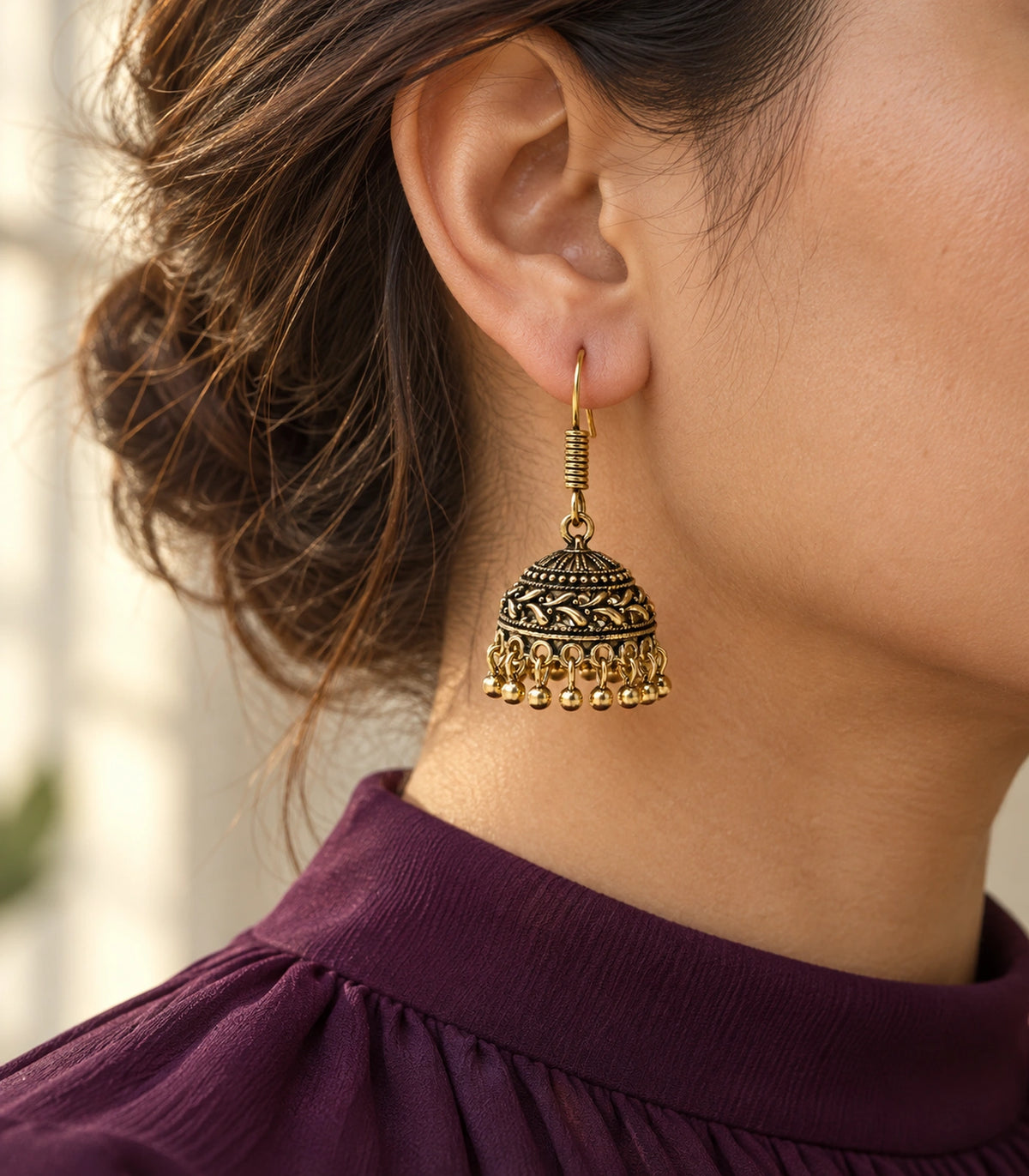 JIMIKI Antique Gold Leaf Scroll Dome Hook Jhumka Earrings - Editorial worn view #color_antique-gold
