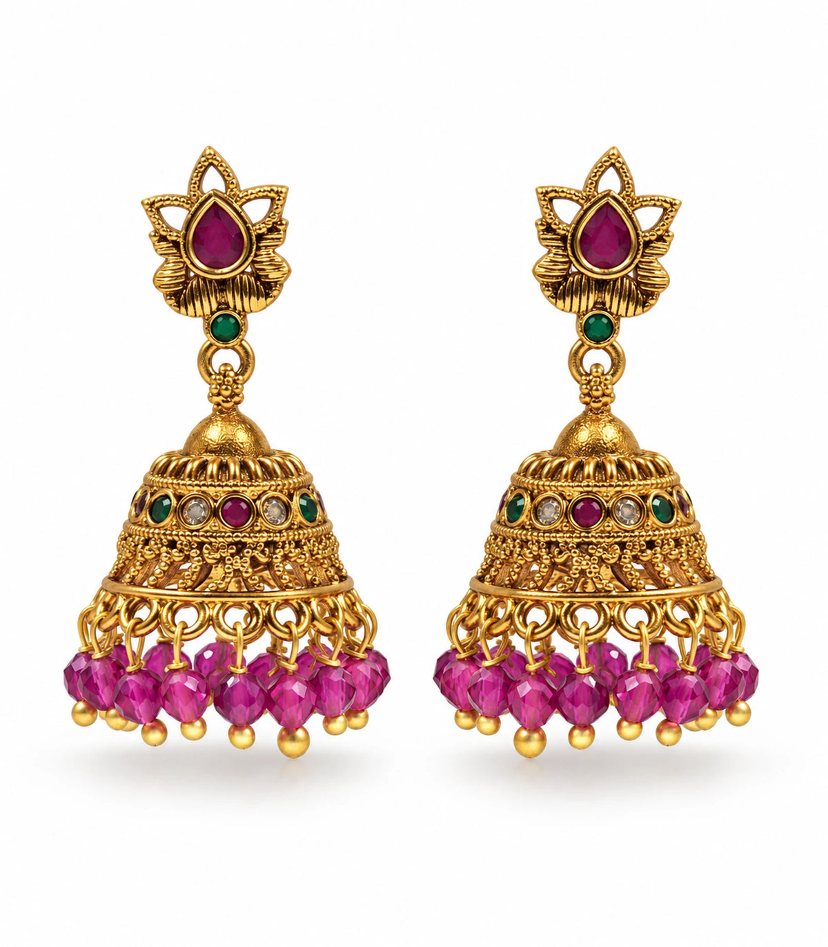 Pair of antique gold-tone lotus jhumka earrings with magenta stones and bead fringe on white