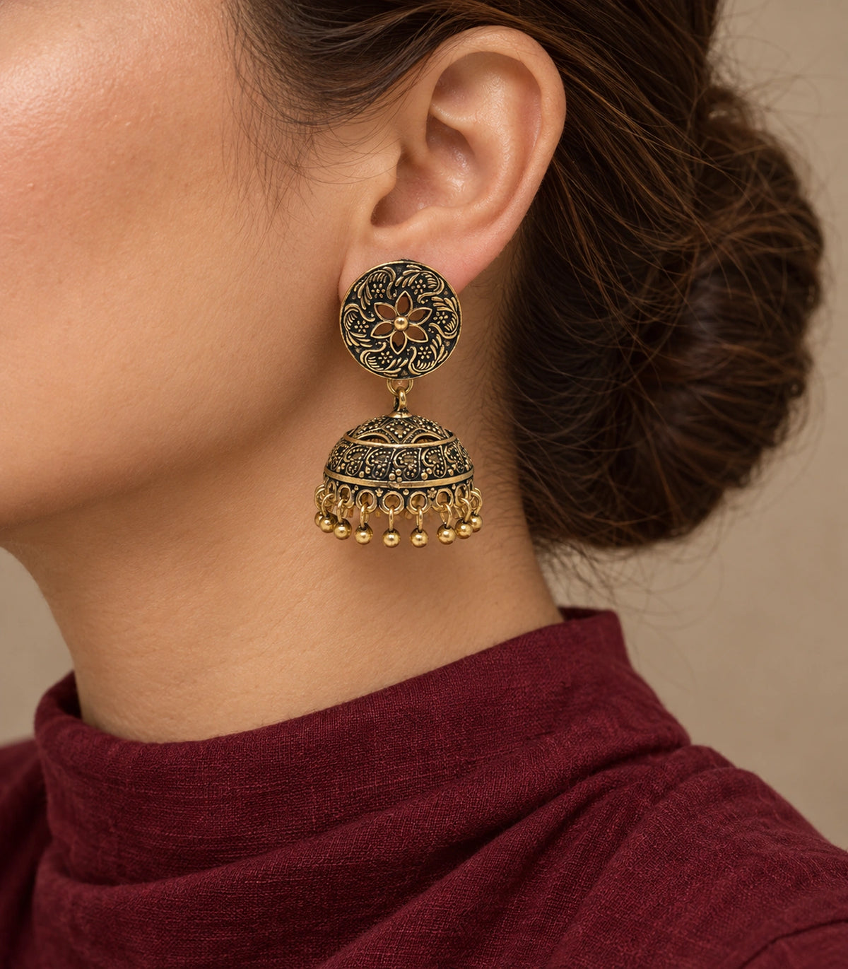 JIMIKI Antique Gold Open Flower Paisley Jhumka Earrings in Antique Gold - editorial worn view #color_antique-gold