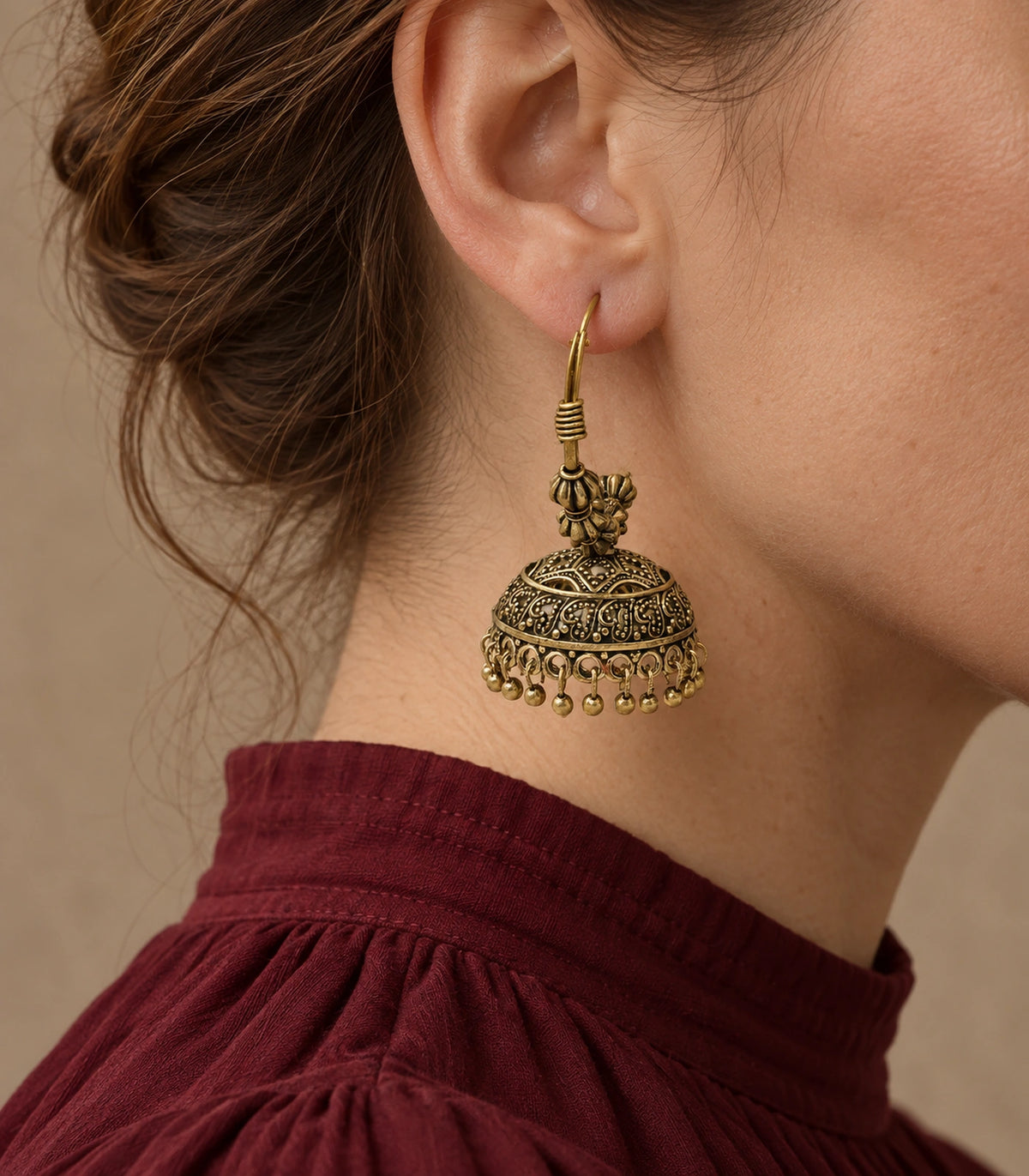 JIMIKI Paisley Beaded Hoop Jhumka Earrings in Antique Gold - editorial worn view #color_antique-gold