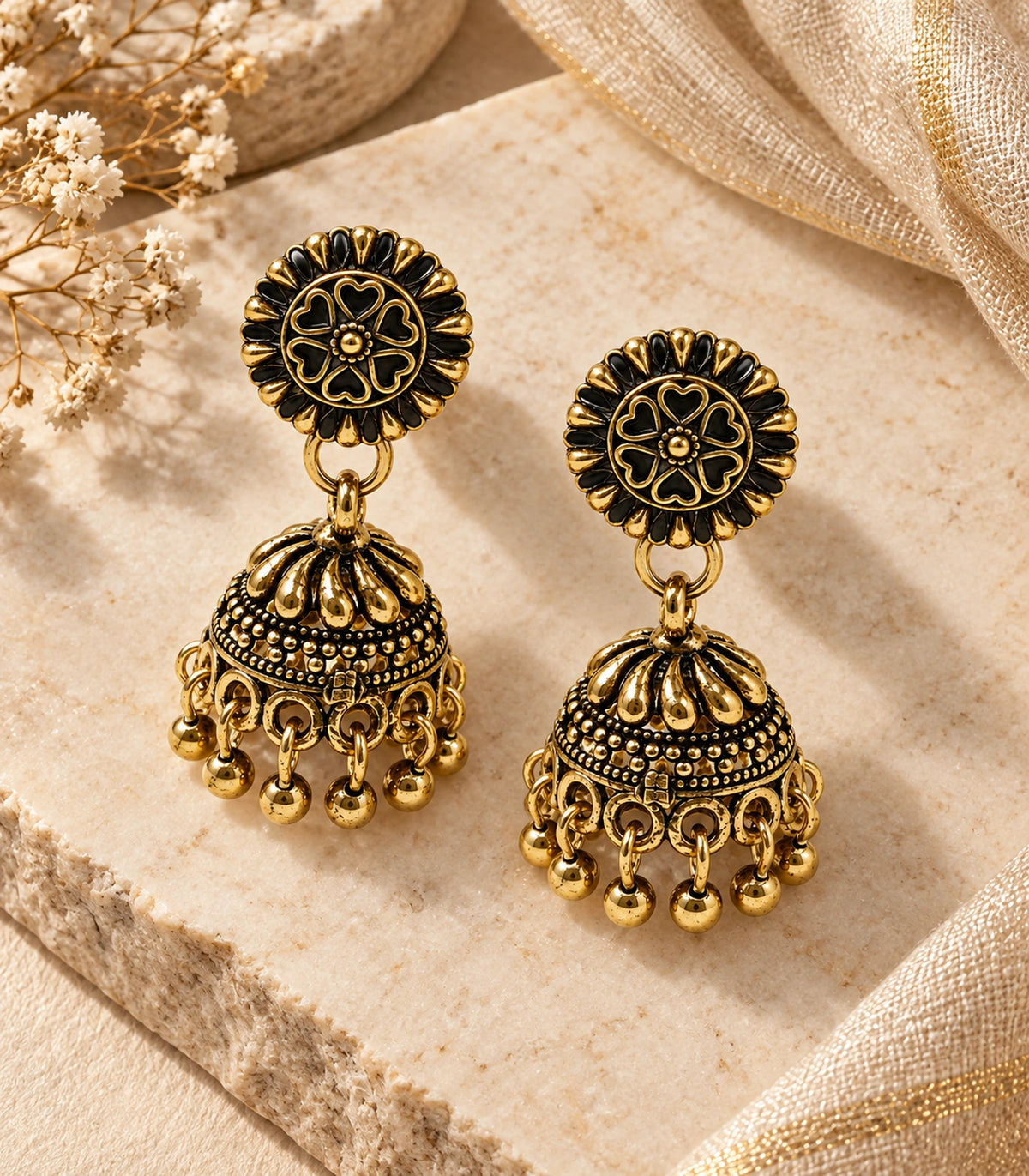 JIMIKI Antique Gold Petal Dome Jhumka Earrings - styled jewellery flat lay #color_antique-gold