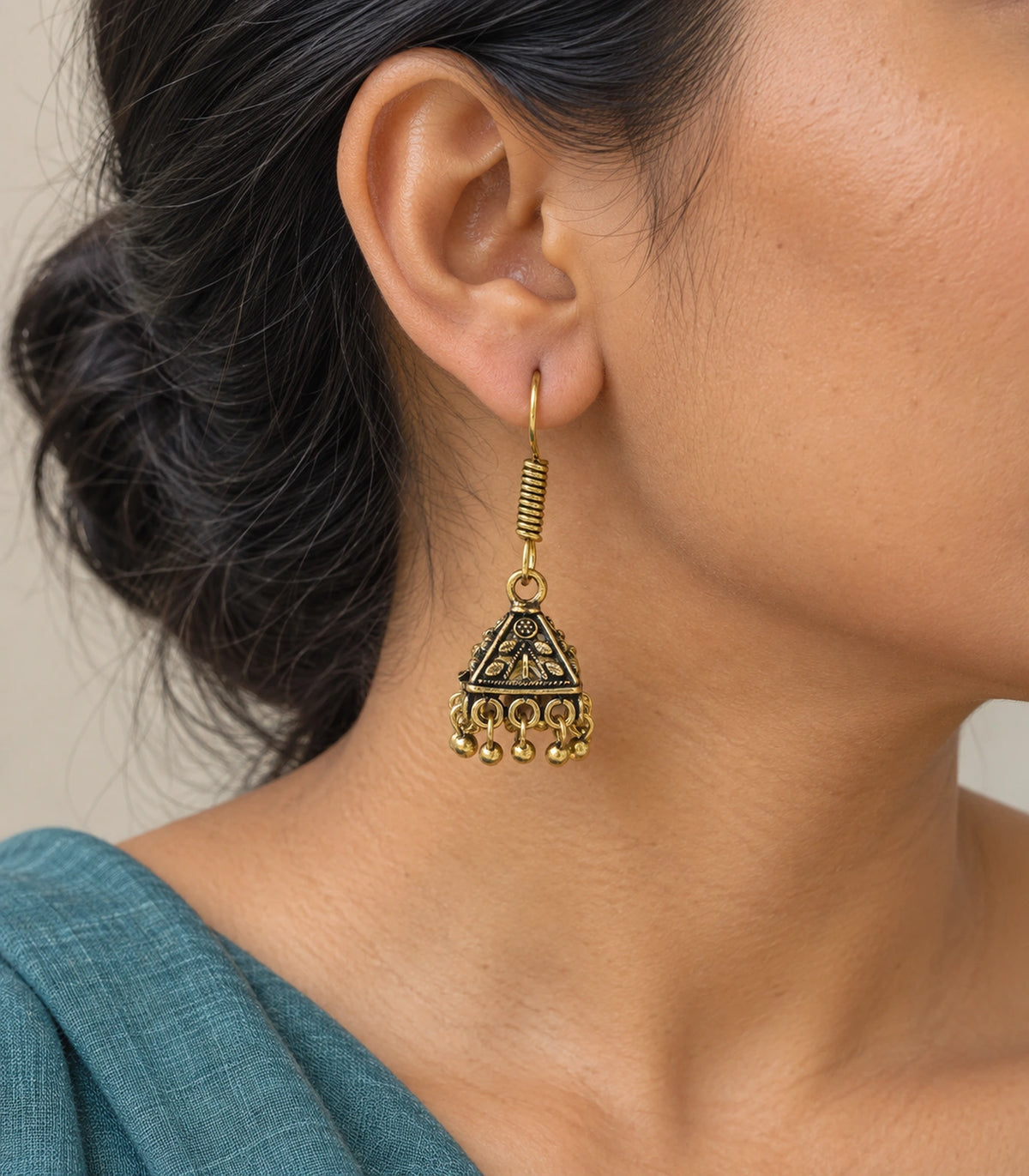 JIMIKI Pyramid Floral Hook Jhumka Earrings in Antique Gold - worn styling view #color_antique-gold