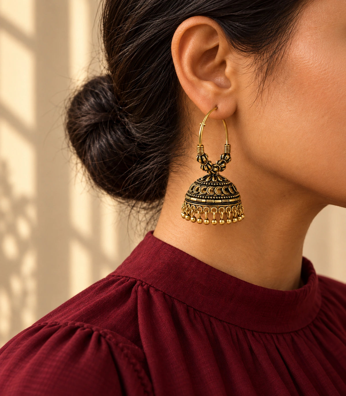 JIMIKI Antique Gold Ribbed Bead Hoop Crescent Jhumka Earrings in Antique Gold - editorial worn view #color_antique-gold